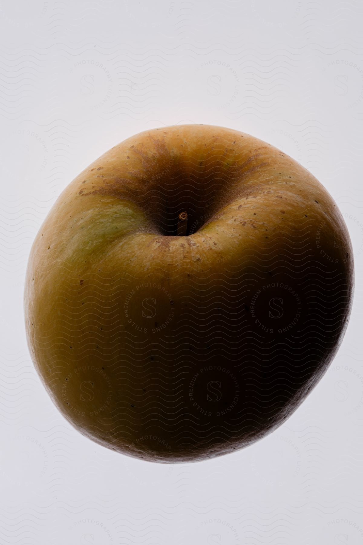 Stock photo of an apple on a white background.