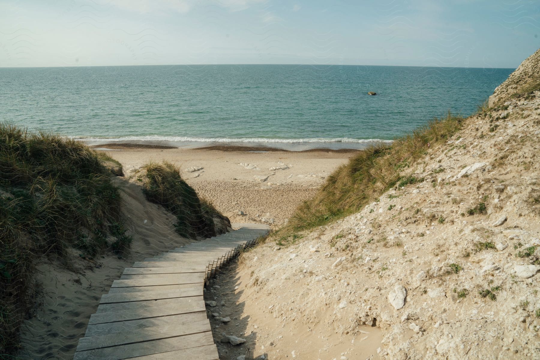 Landscape of a walkway giving access to a beach