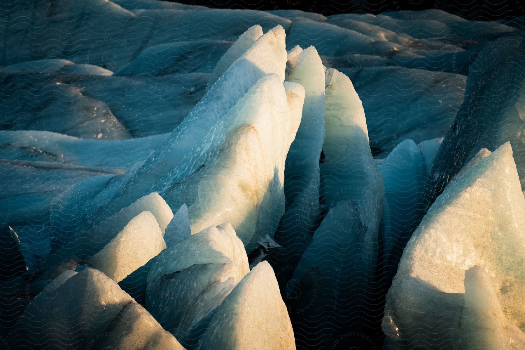 Pointy ice caps glistening in the sunlight.