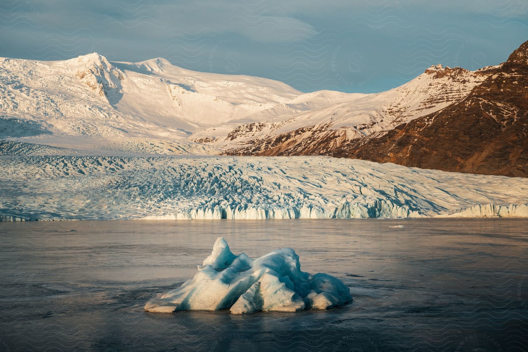 Water landscape and surrounding glaciers with snow covered mountains