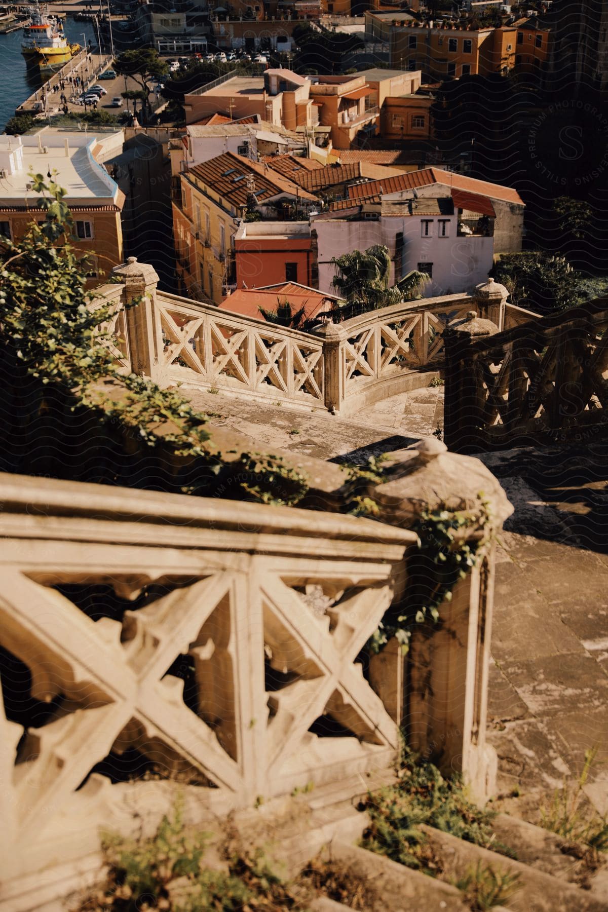 A historic stairway offering a picturesque glimpse into a vibrant coastal town.