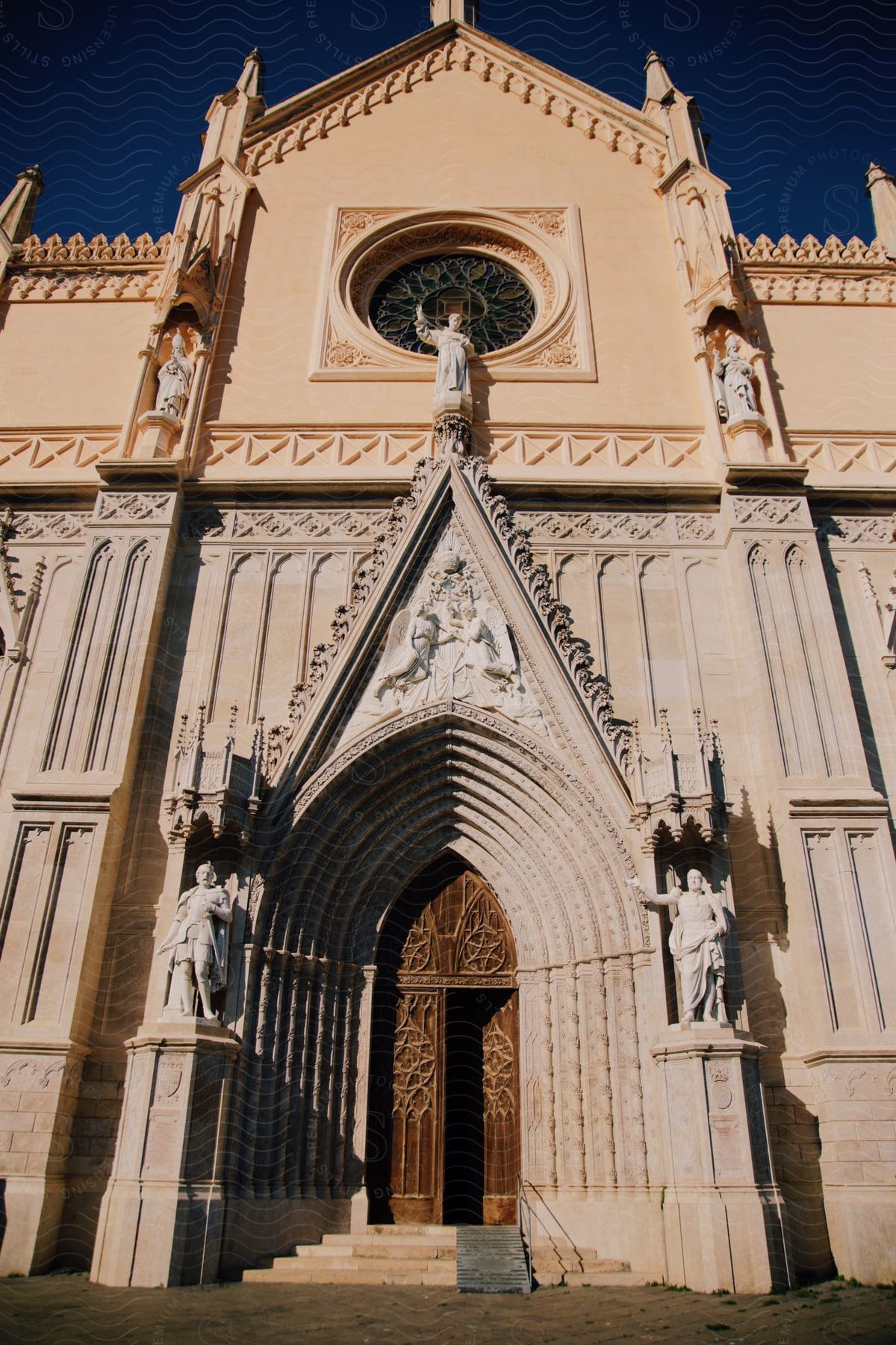 façade of an old cathedral building on a sunny day