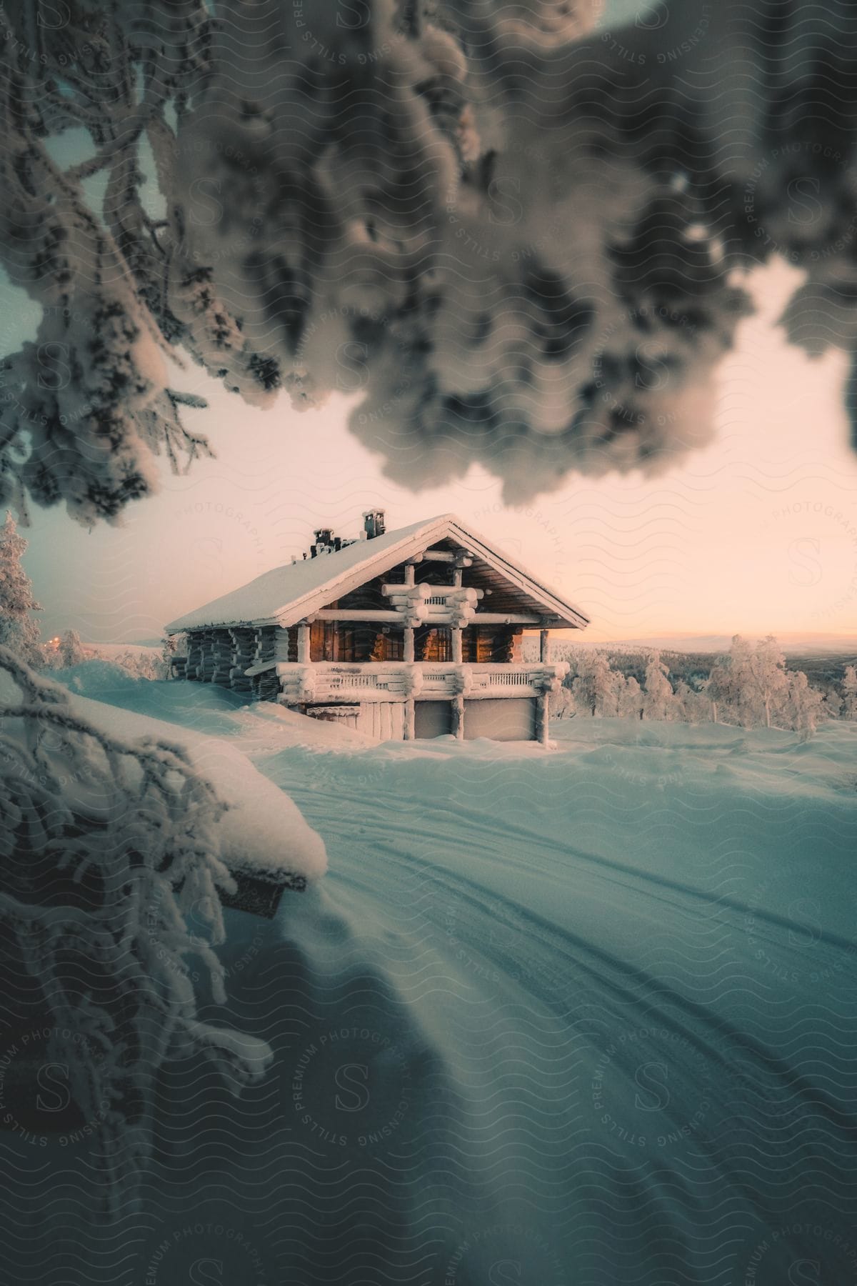 A house in a rural area covered in snow