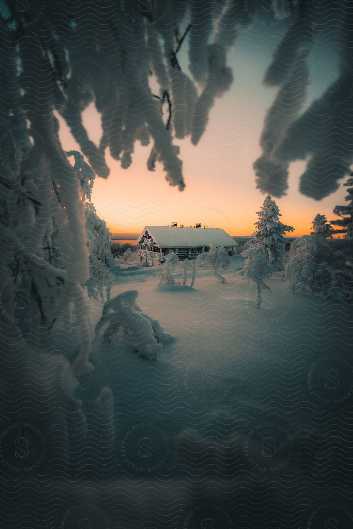 A view of a rural house with snow all over it.