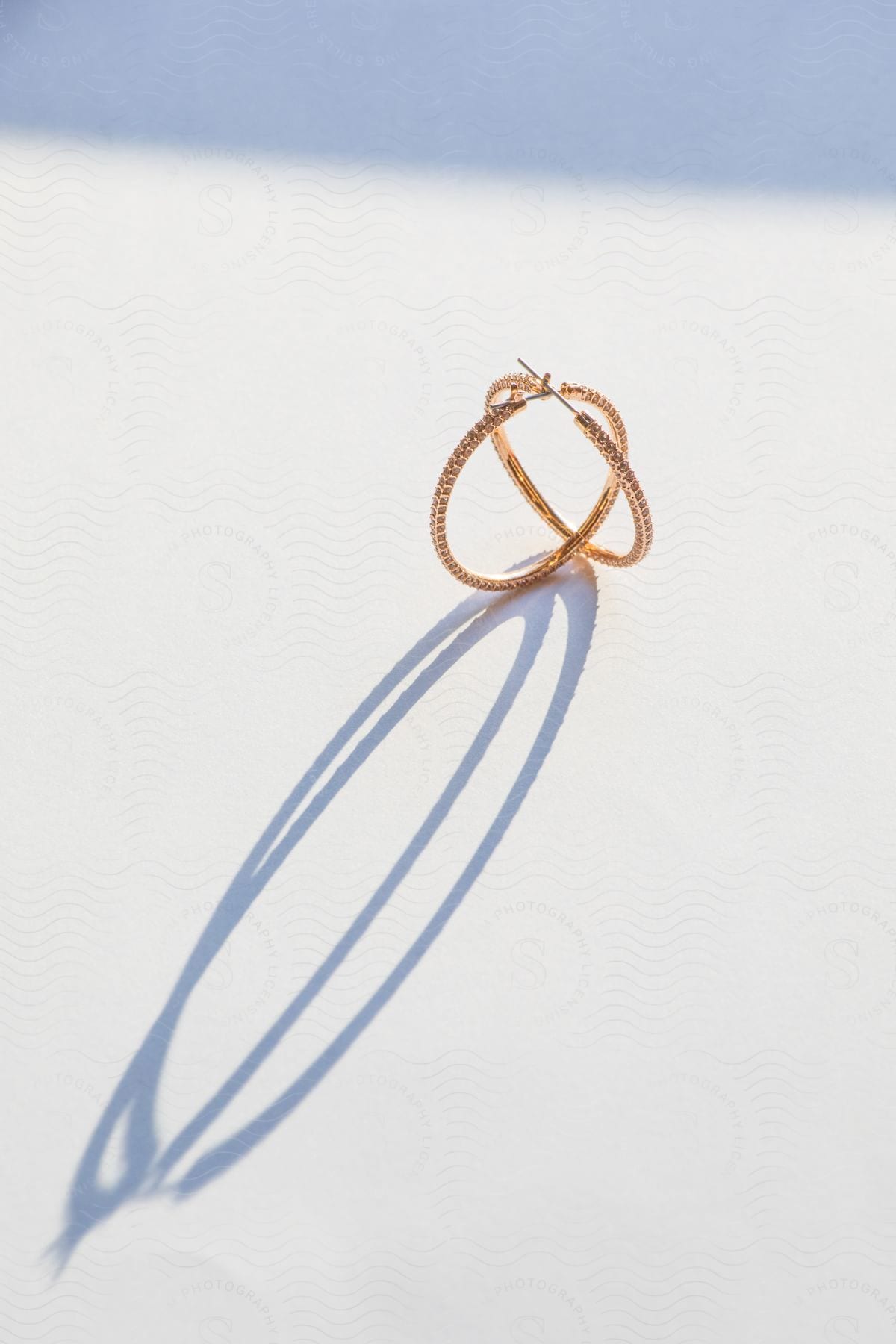 Close-up of a rose gold-plated earring