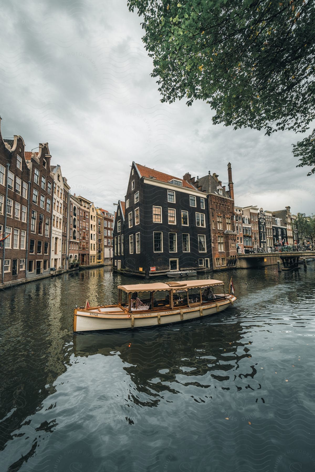 Canoe through the Amsterdam Canals on a cloudy day