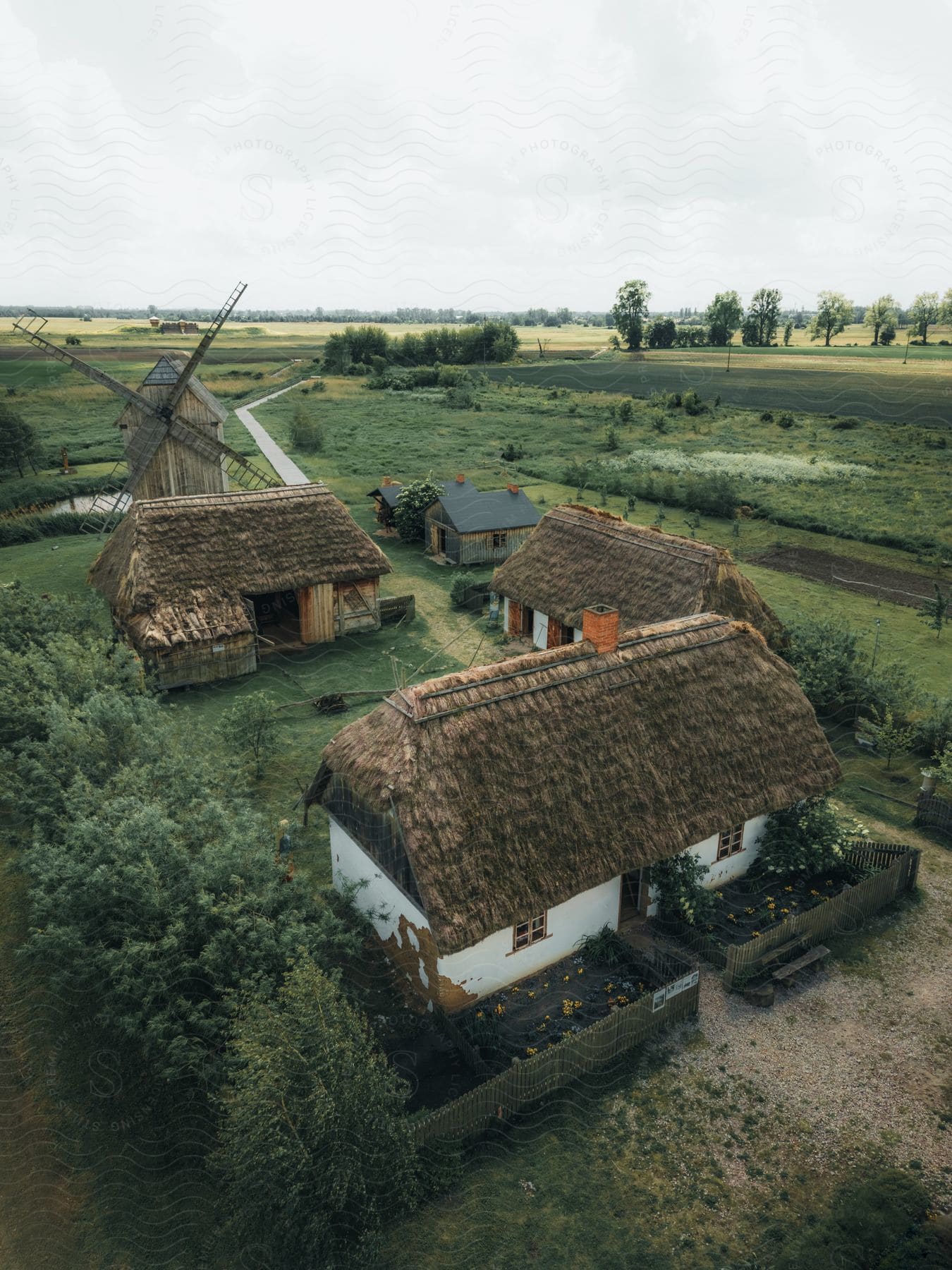 A view of some farmhouses in a rural area.