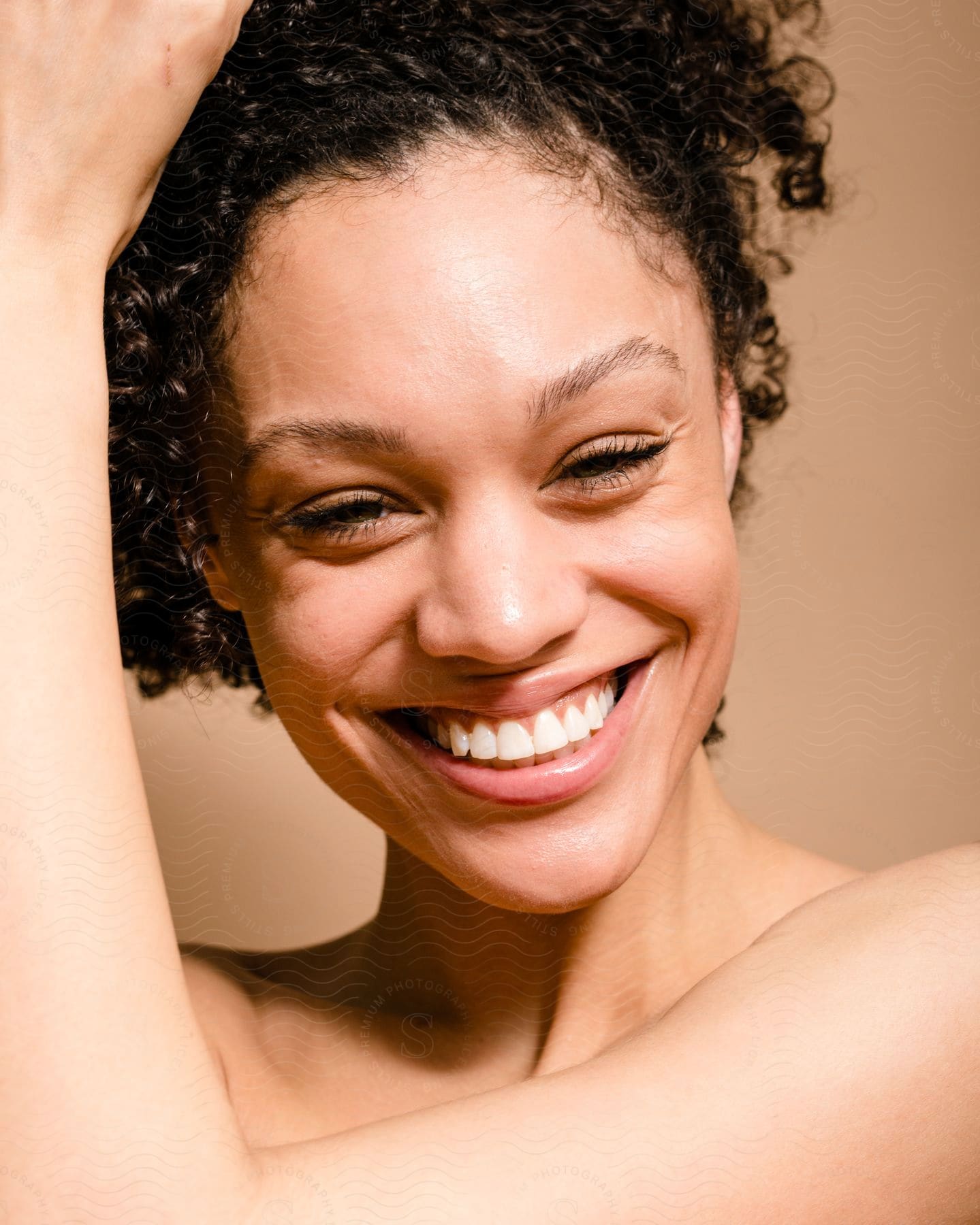 a woman staring into the camera smiling