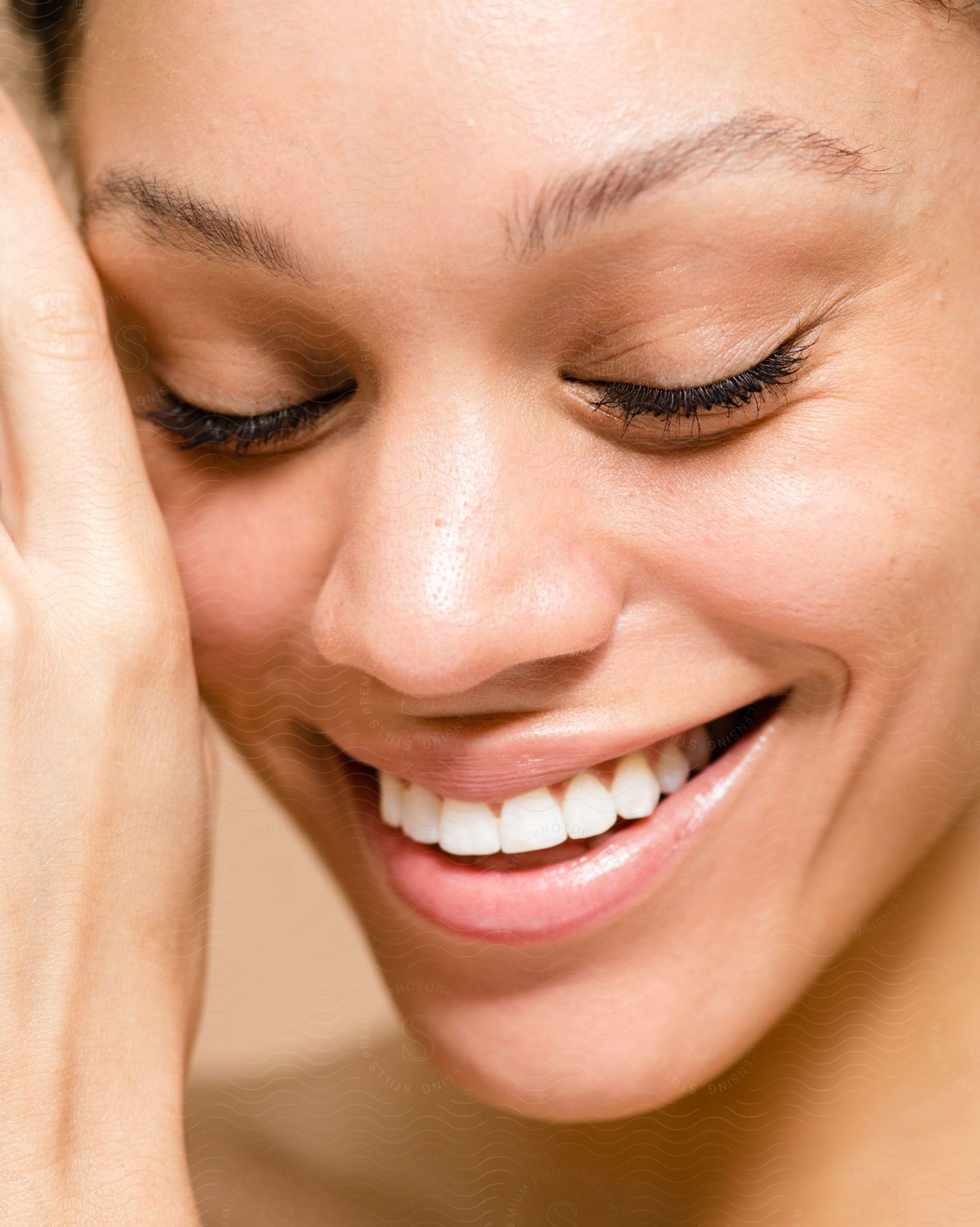 Close-up of a woman's face with smooth, soft skin.