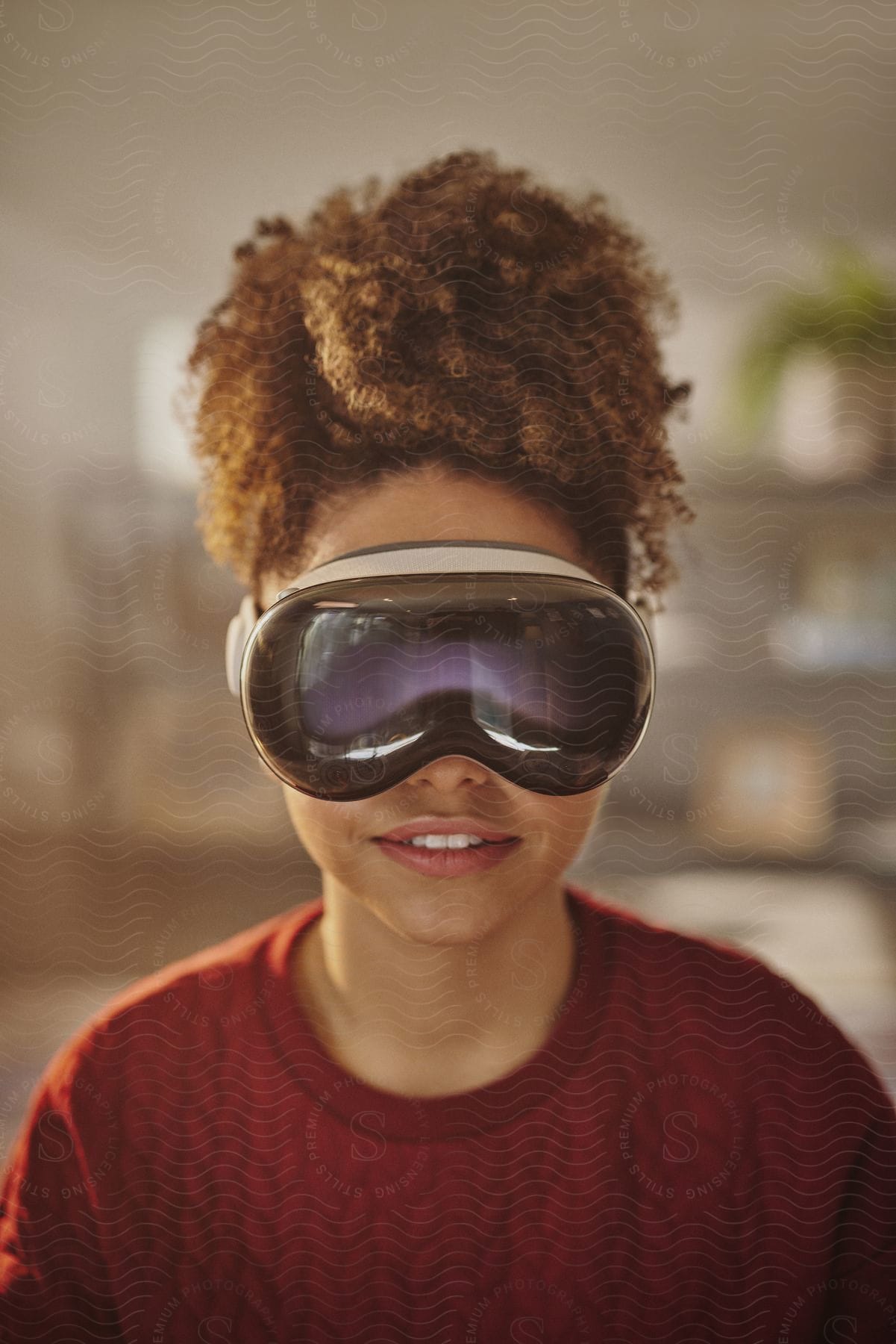 Portrait of a young woman with a smile wearing virtual reality glasses