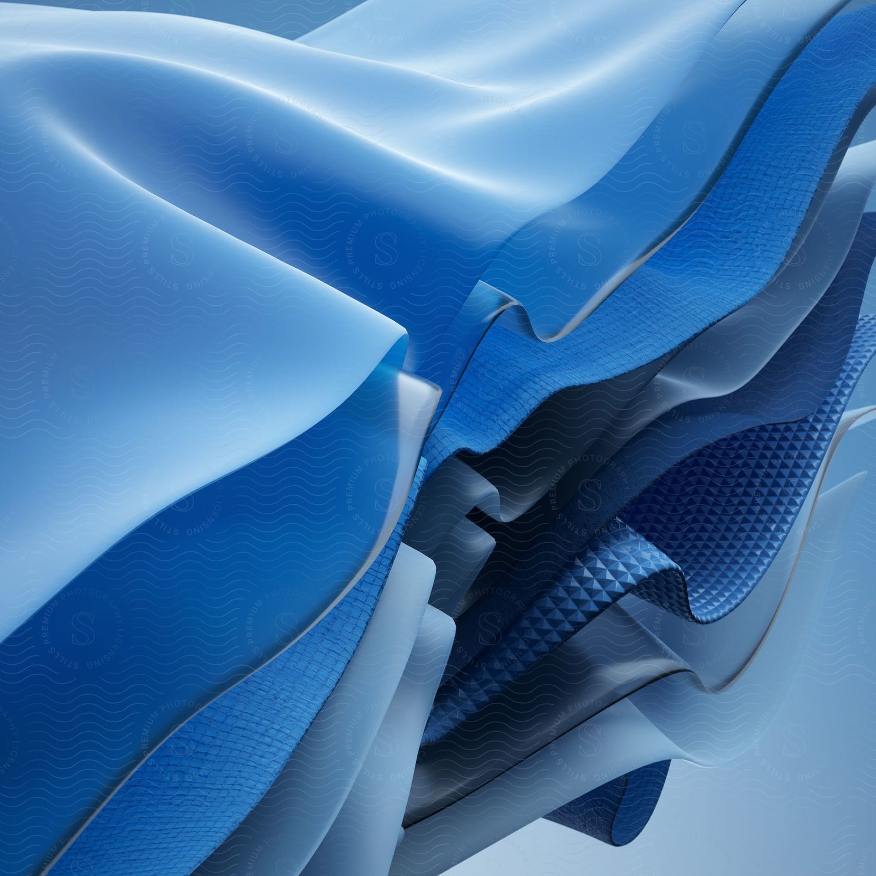 Abstract and fluid meshes, predominantly in various shades of blue, creating a sensation of movement and fluidity.