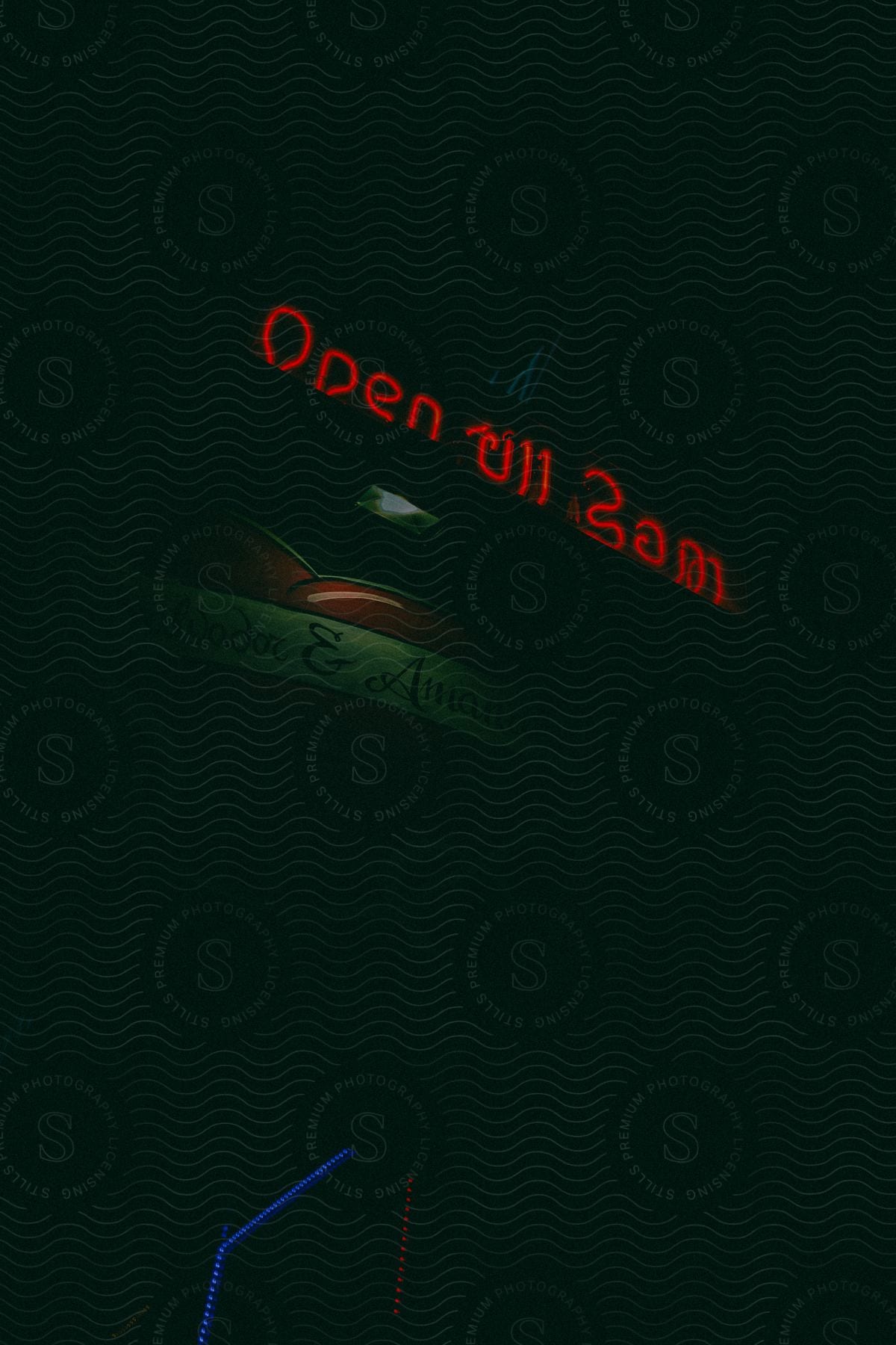 a business sign in the middle of the night that says open till 3am