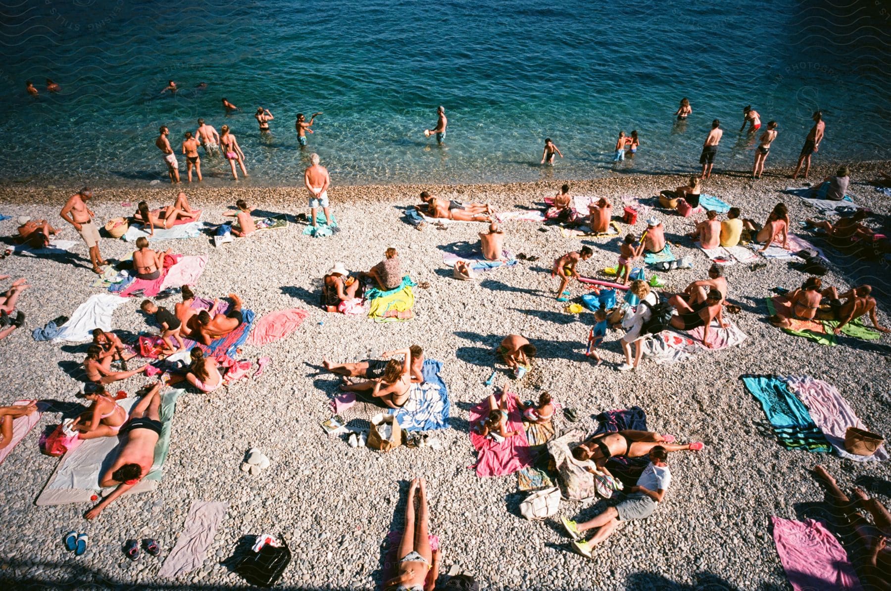 People enjoy the beach and the water during the summer.