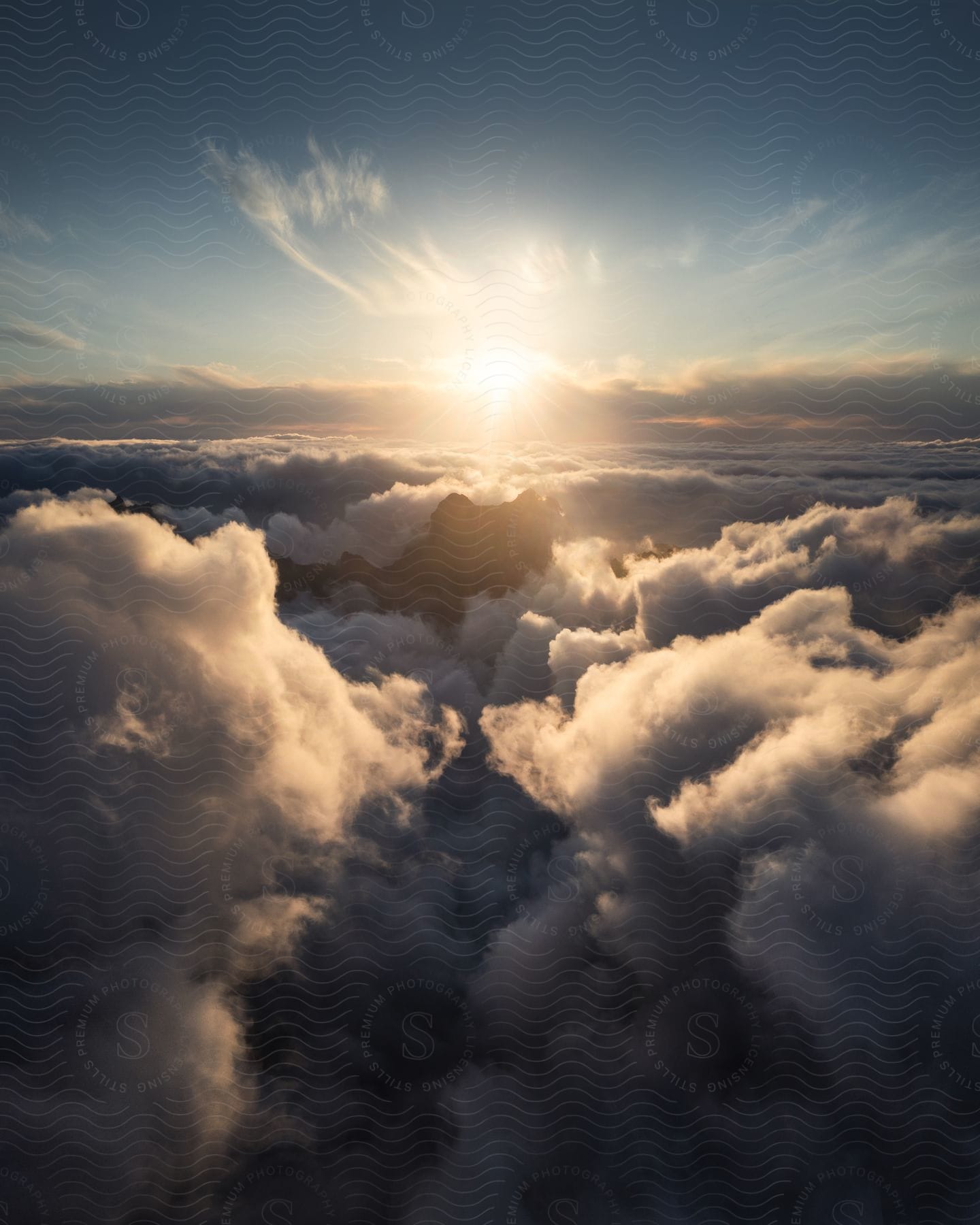 Aerial scenery of clouds and the reflection of the morning sun on the horizon