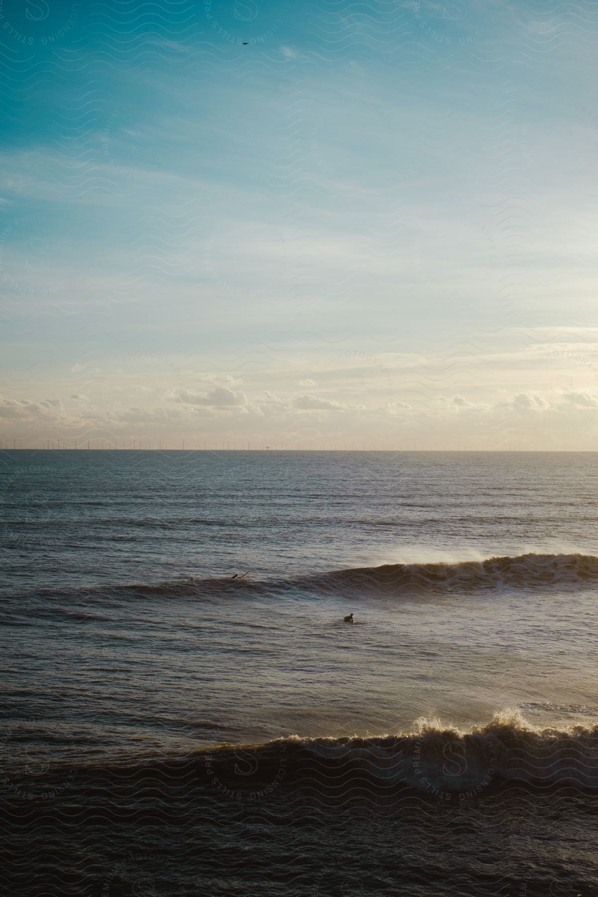 A view of waves crashing on the ocean.