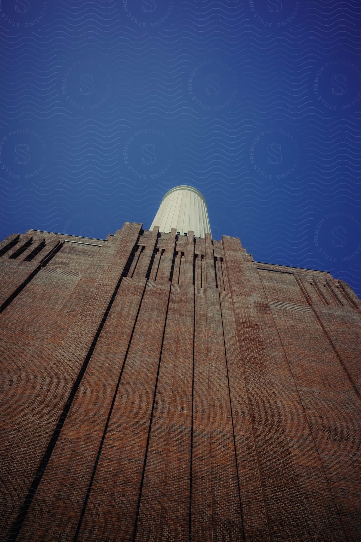 Exterior architecture looking towards Battersea Power Station on a blue sky day.