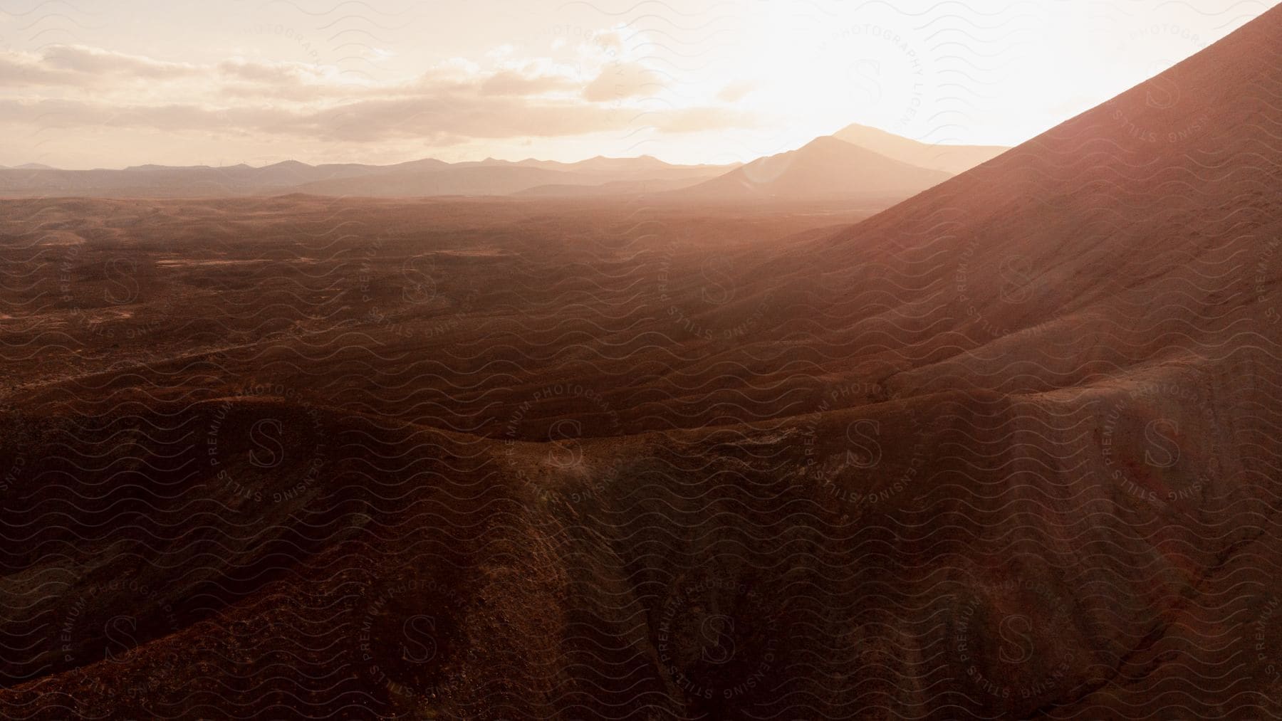 A Vast Desert Area With Mountains