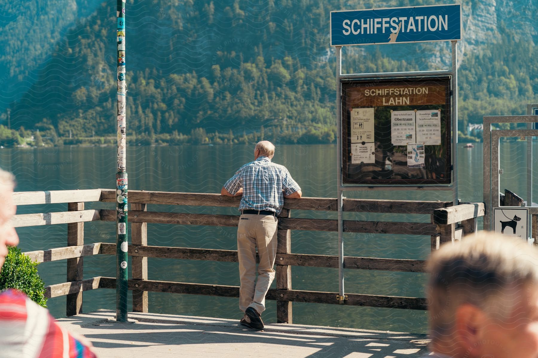 Elderly tourists on the LAHN ship dock in Germany.