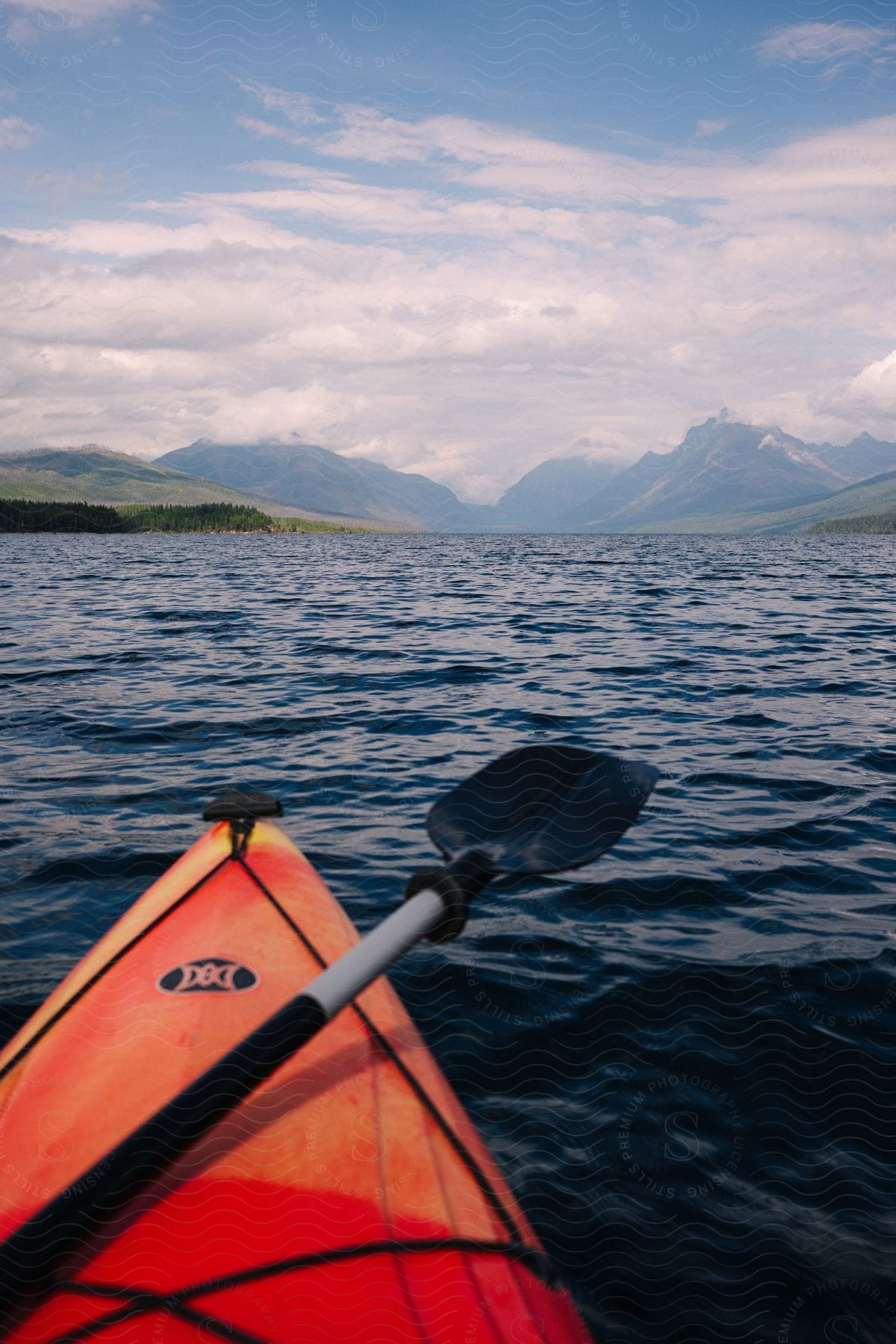 A view of a kayak floating on the water on a lake