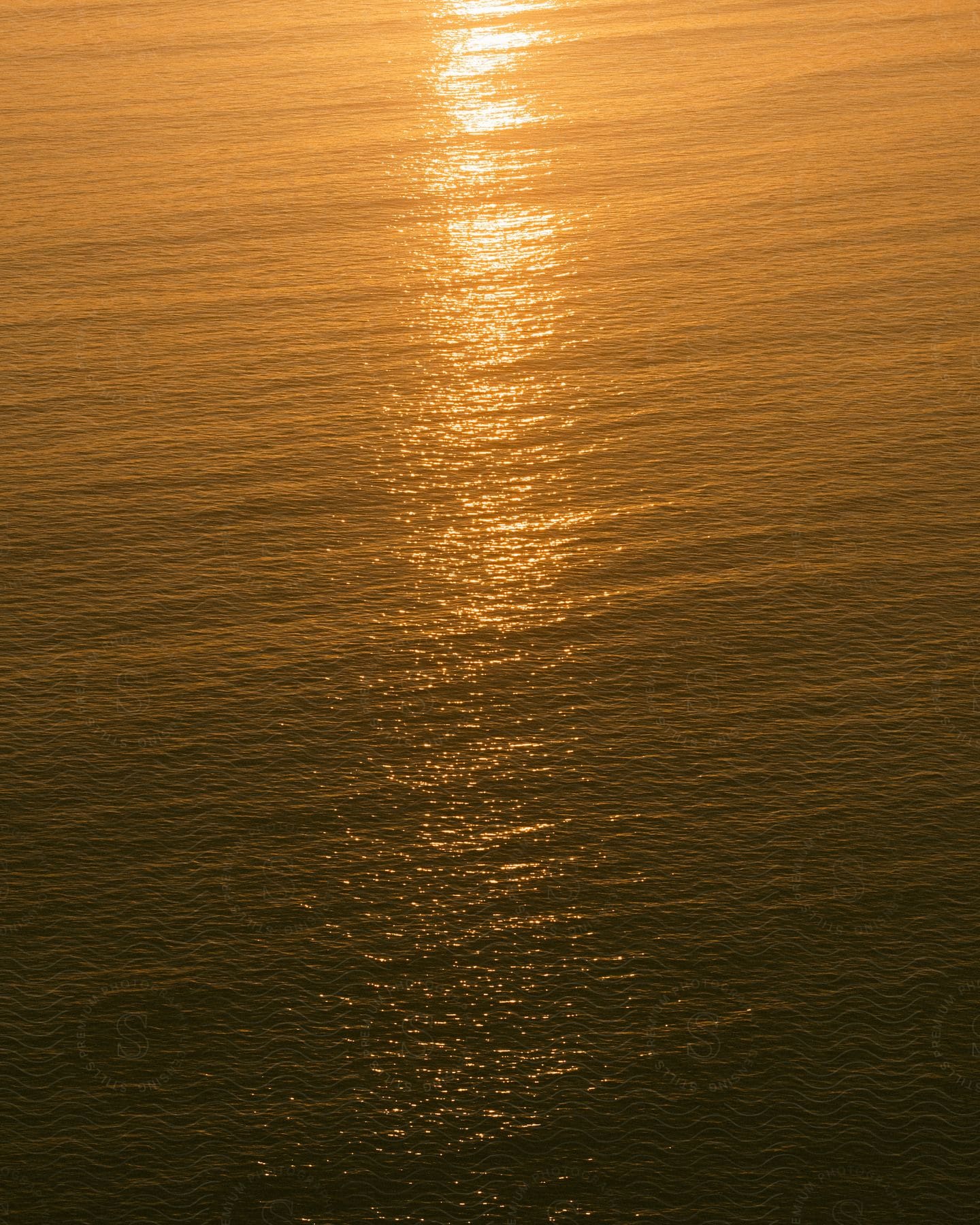 Sunlight hitting and reflecting on the sea water during sunset