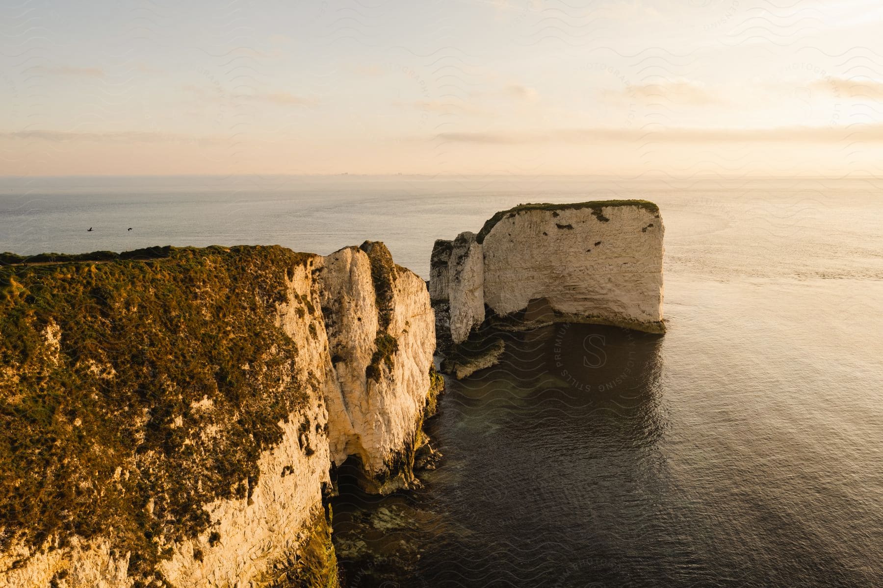 Landscape of Old Harry Rocks in the middle of the sea on a morning