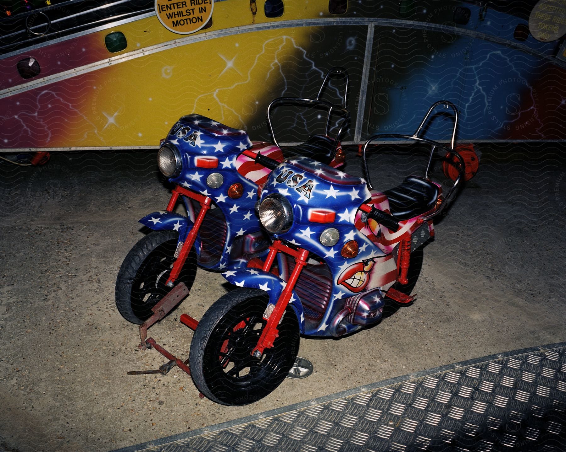 Two motorcycles sitting in a room