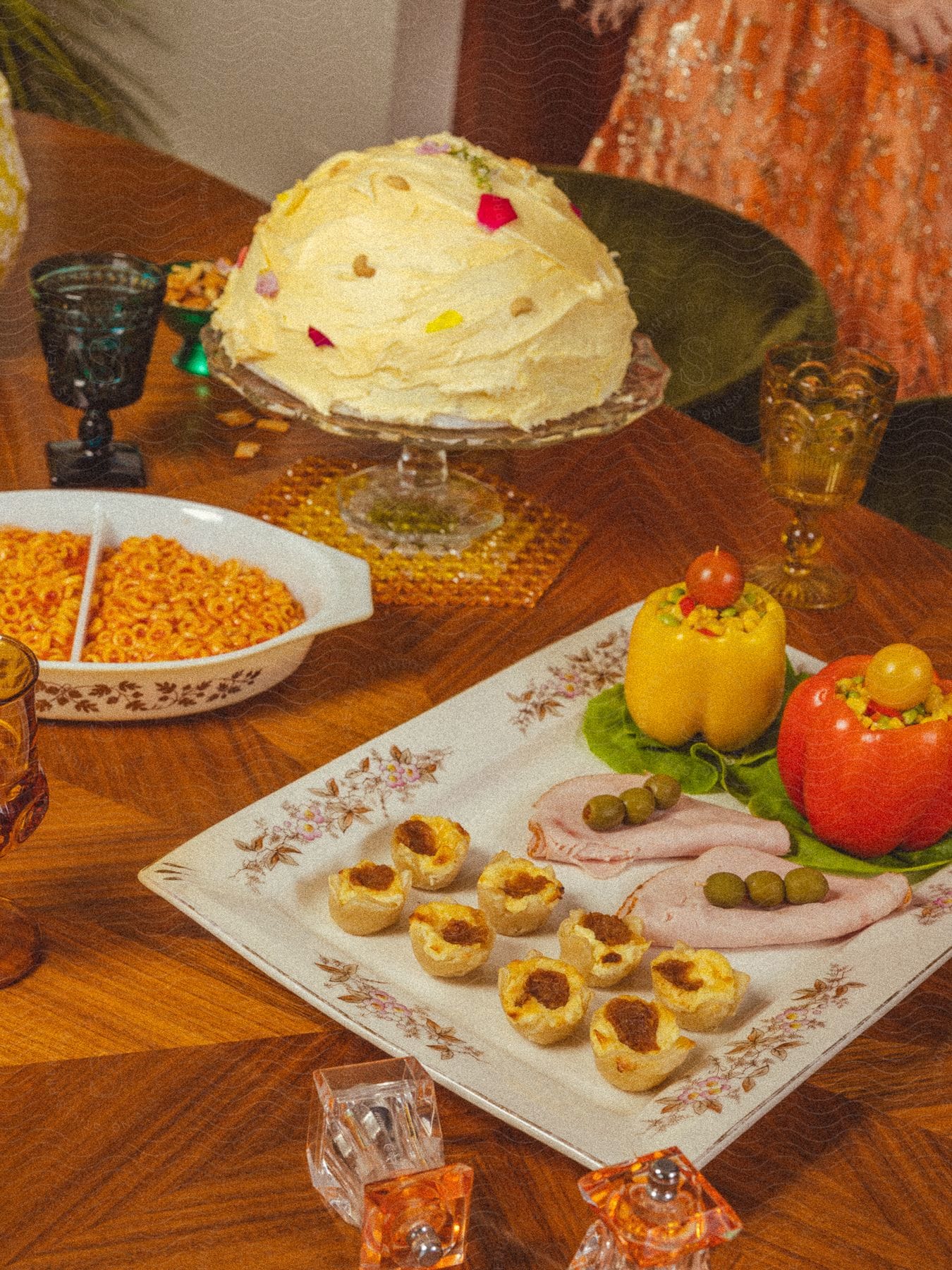 Several plates worth of food sitting on a table.