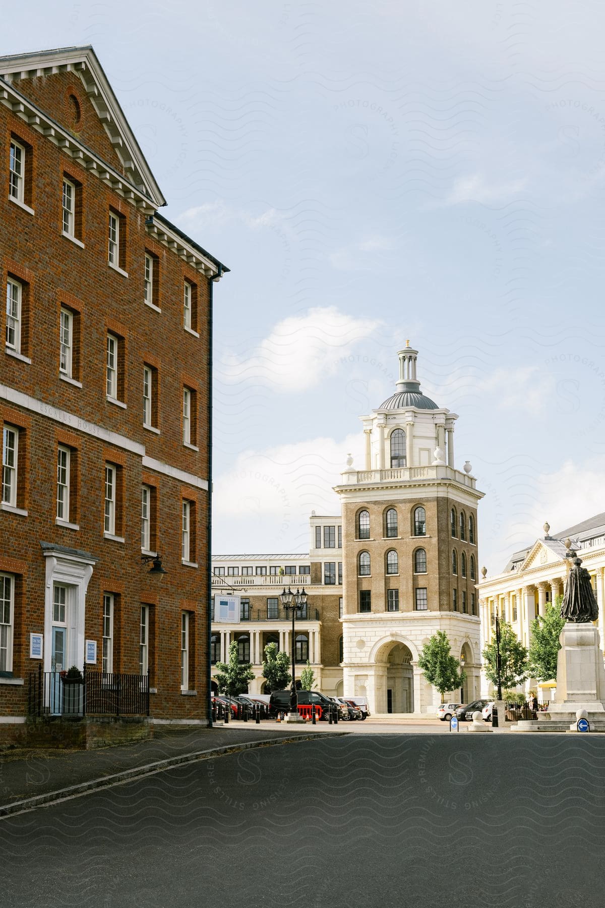 Street of an urban city with the Royal Pavilion in the background.