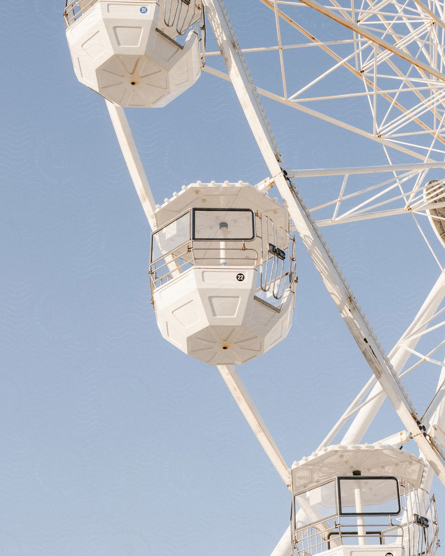 A view of a ferris wheel outdoors on a sunny day