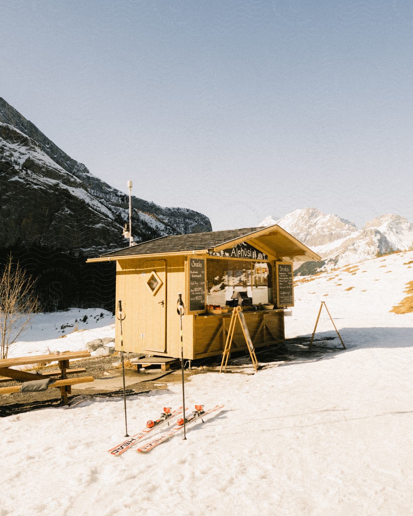 A view of a small shack out on a mountain