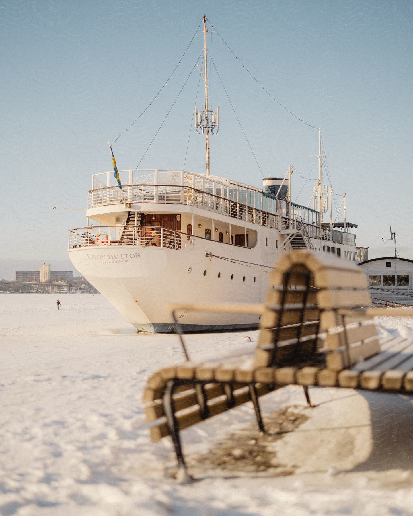 A view of a boat sitting on some ice