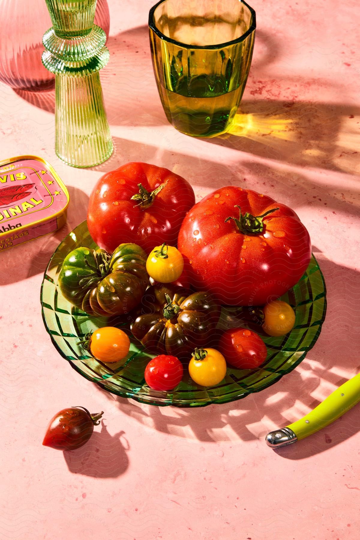 Stock photo of vegetables and fruit with a drink and a can of sardines