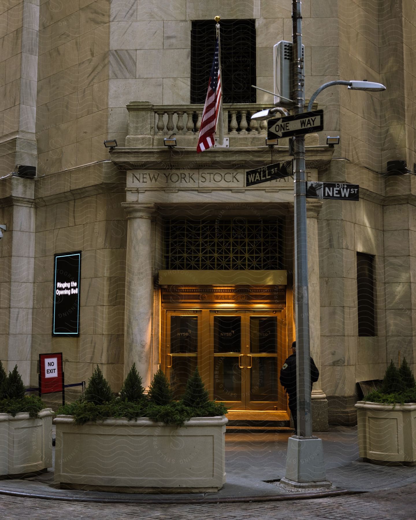 Exterior Facade Of The New York Stock Exchange With The United States Flag