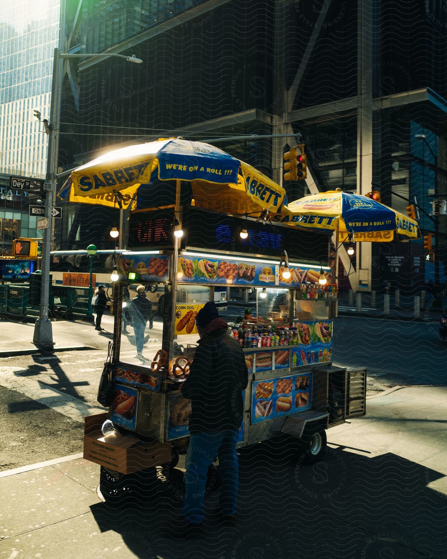 Food truck with snacks on the sidewalk of a metropolis during the day