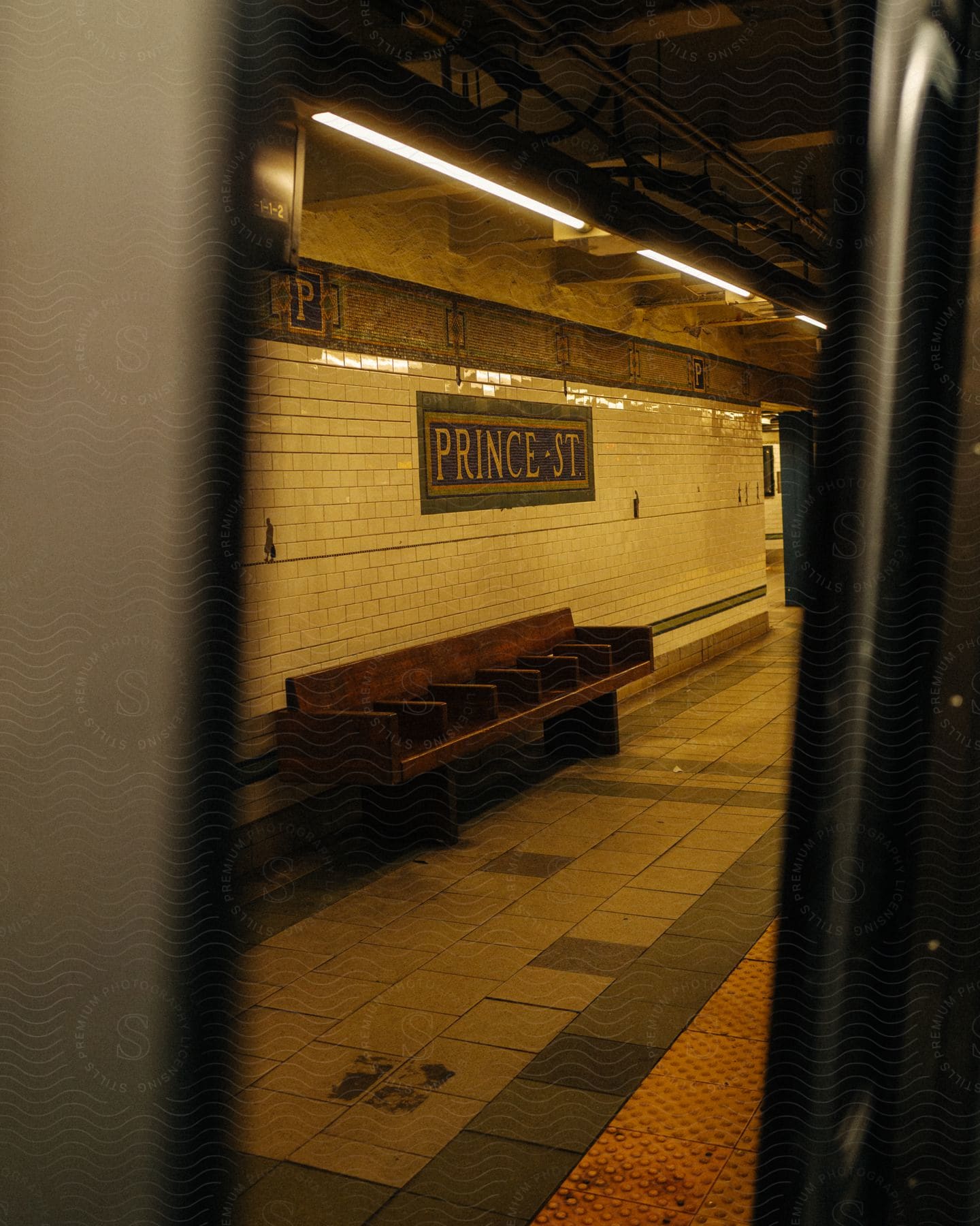 A view of a train station from a subway train