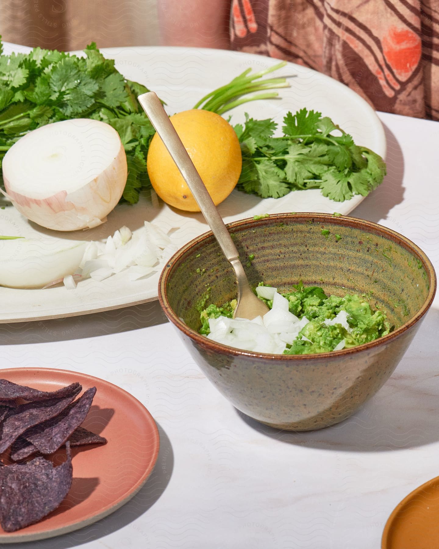 A dish of food with onions and lemons