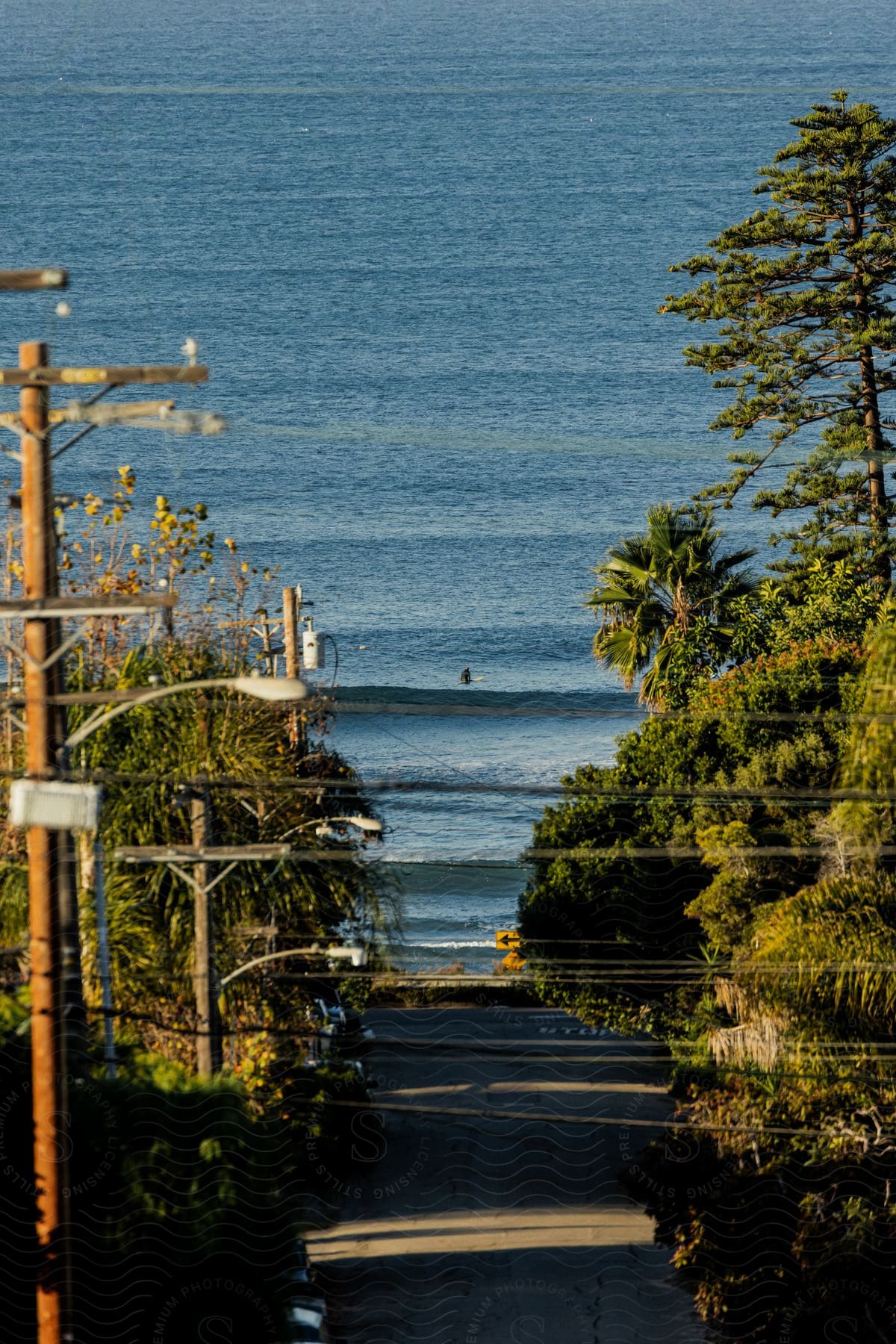 Asphalt street overlooking a beach