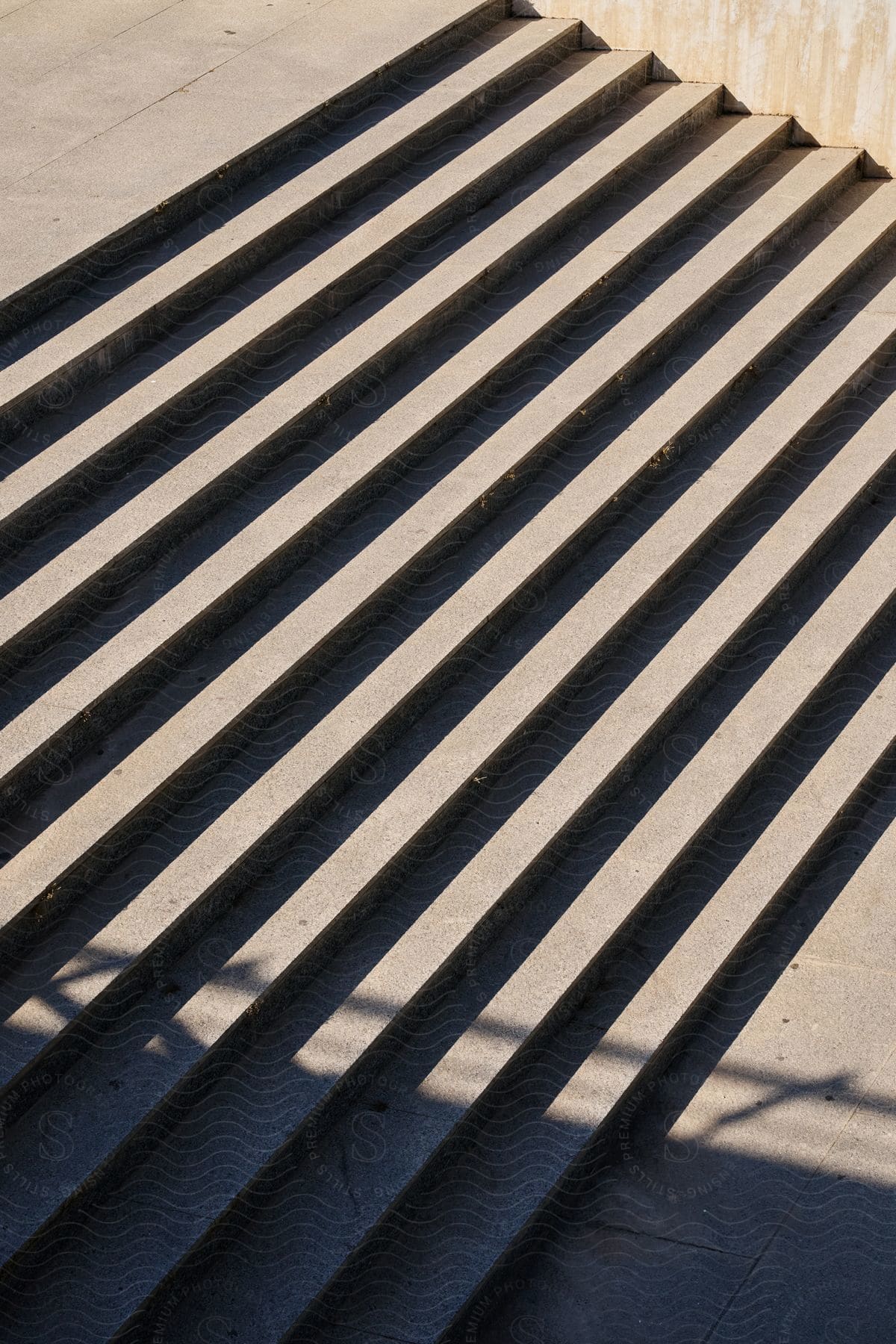 A view of a staircase made out of concrete on a sunny day