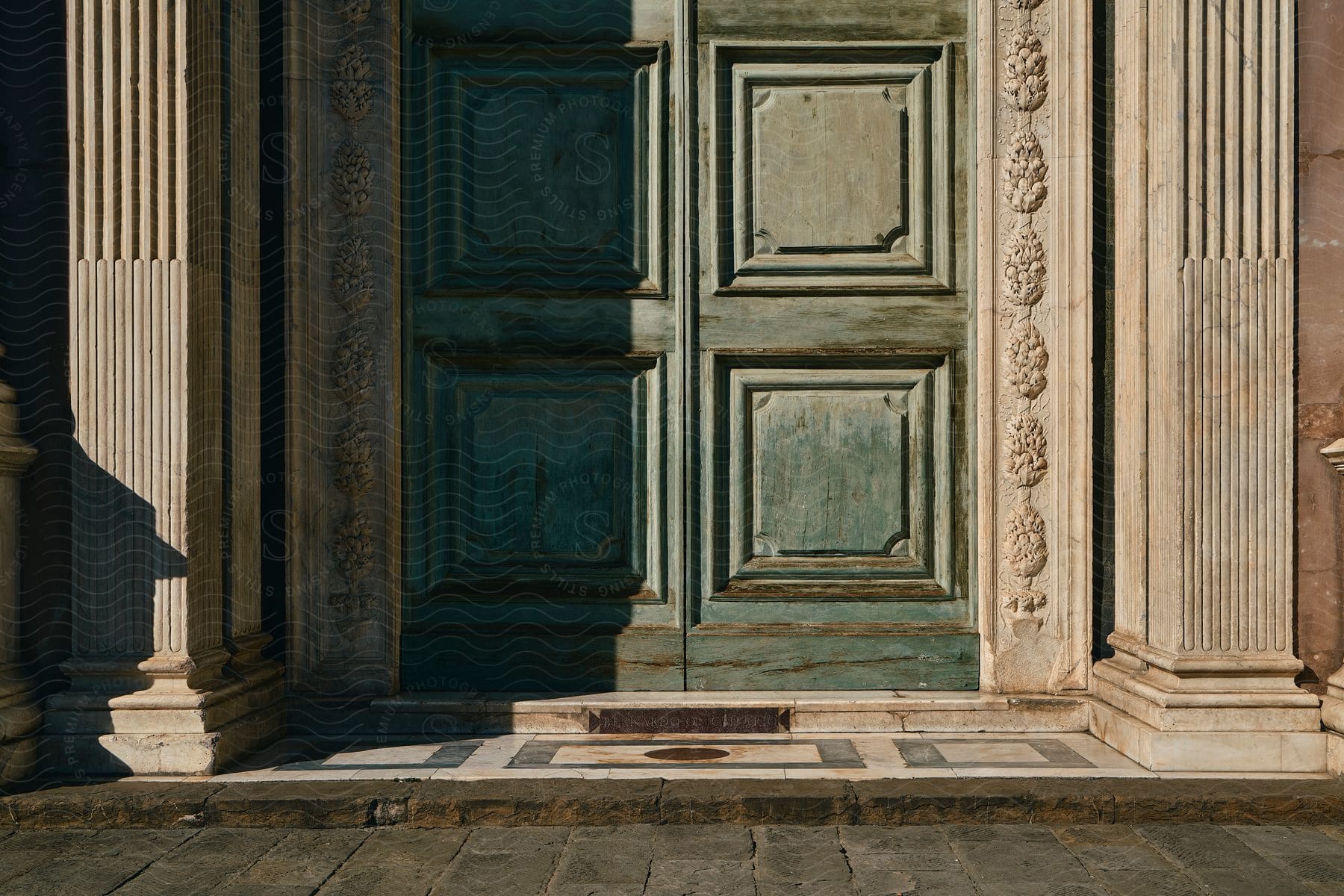 Some Wood Doors On An Ancient Building Outdoors