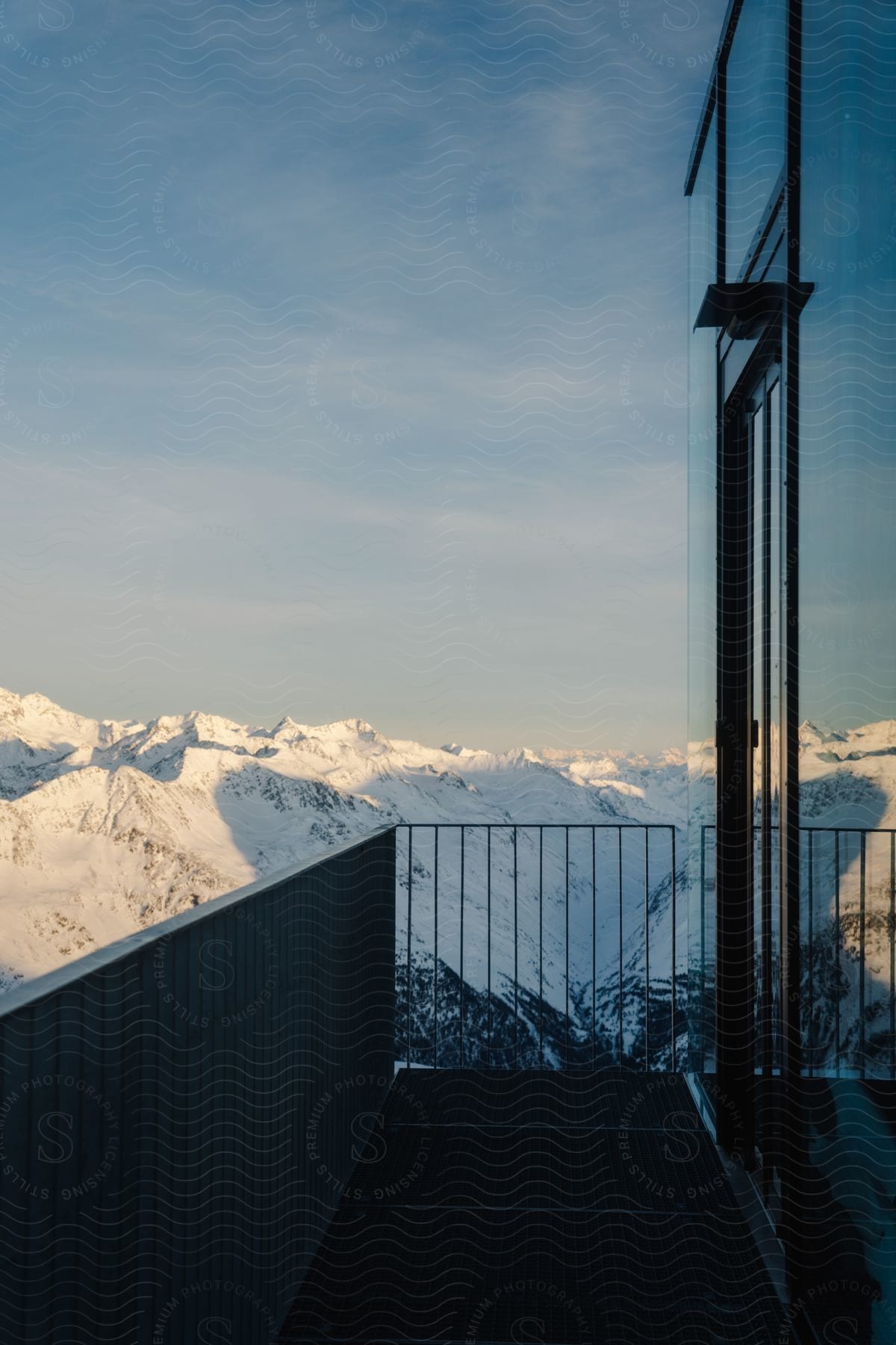 A view of a mountain range with snow covering it