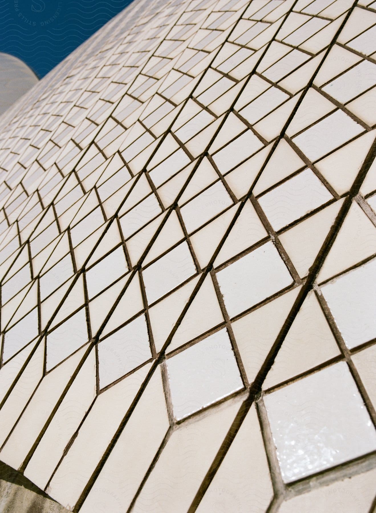 A tiled wall forming a designer and everything is white