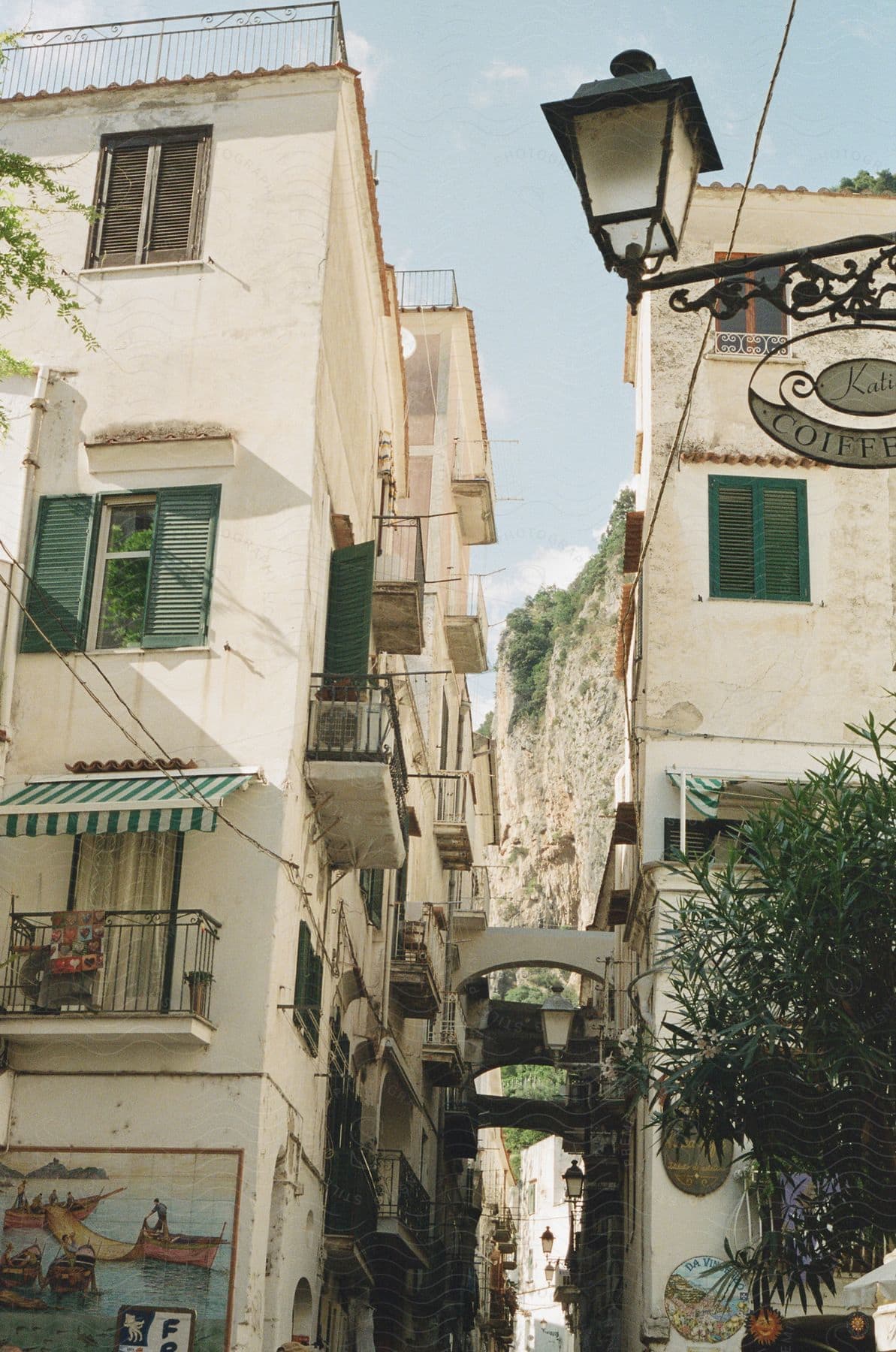 A view of some buildings in a city on a sunny day