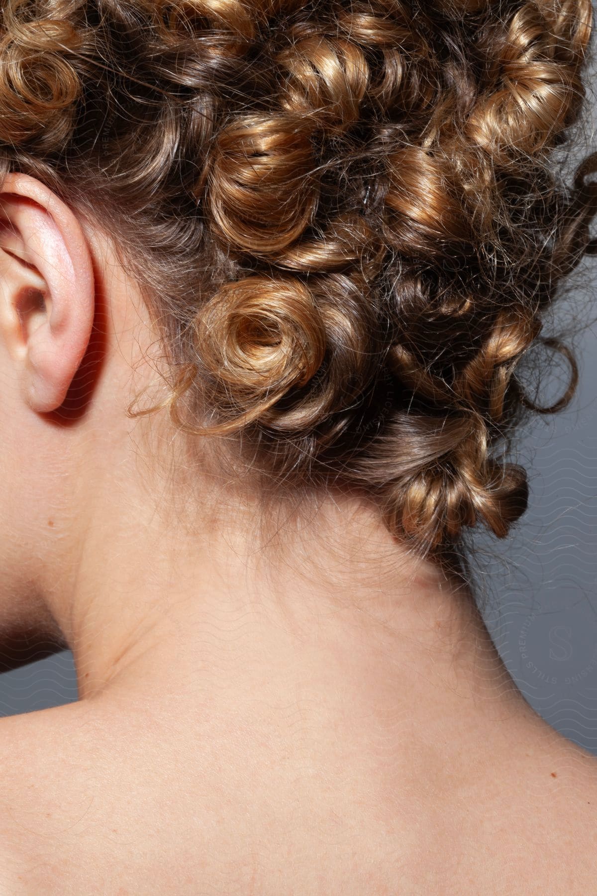 A woman with curly hair