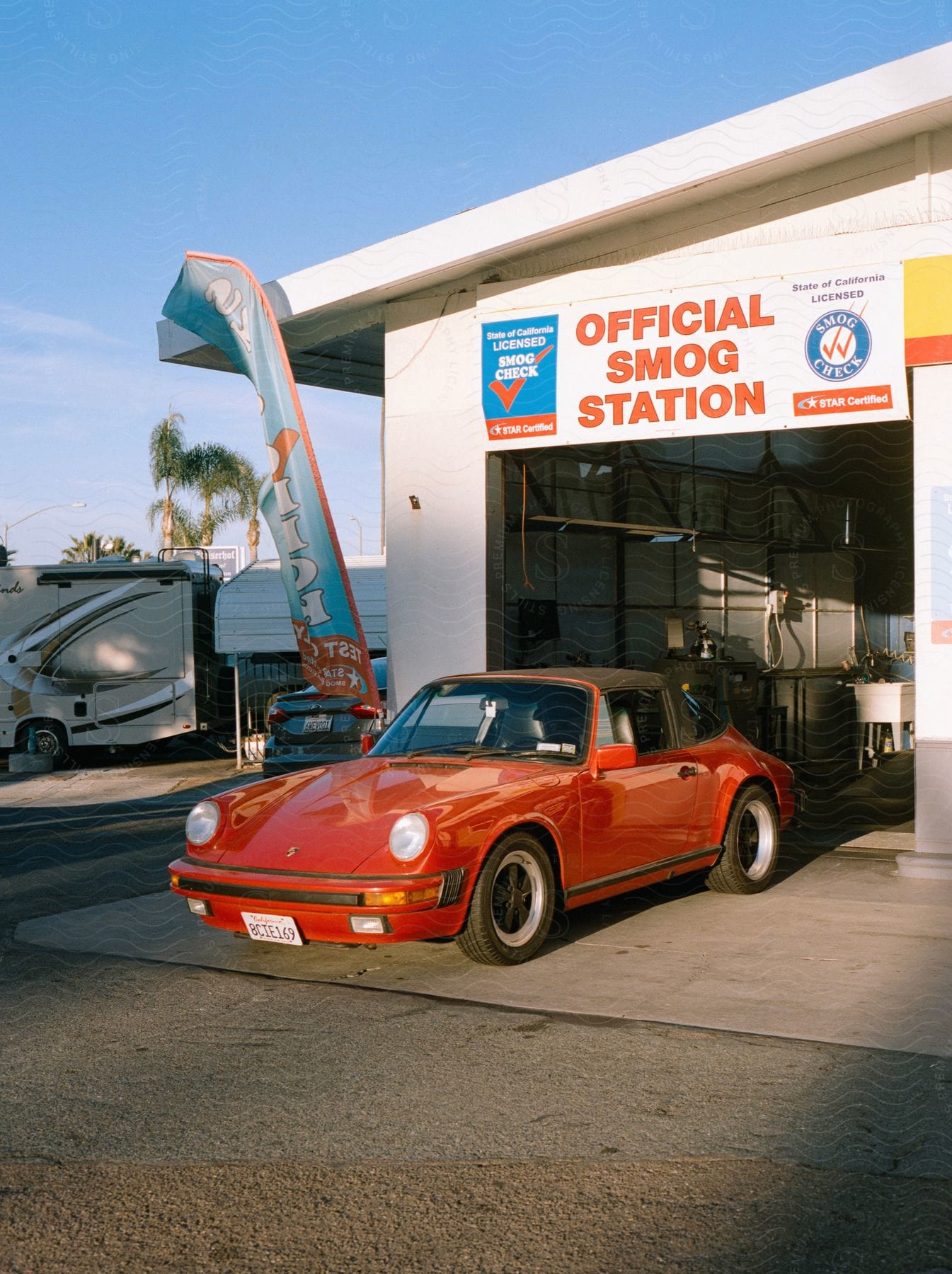 Car parked outside a service station garage