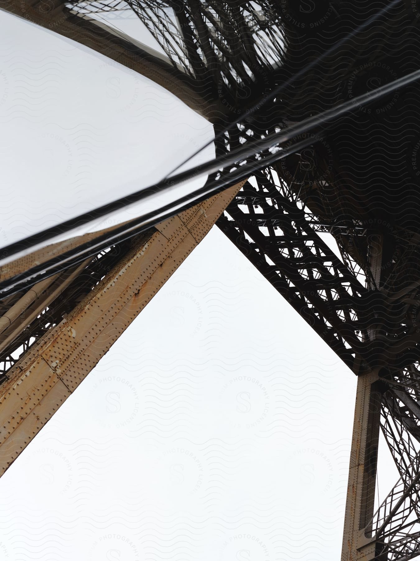 Stock photo of the structural framework of the eiffel tower against the sky