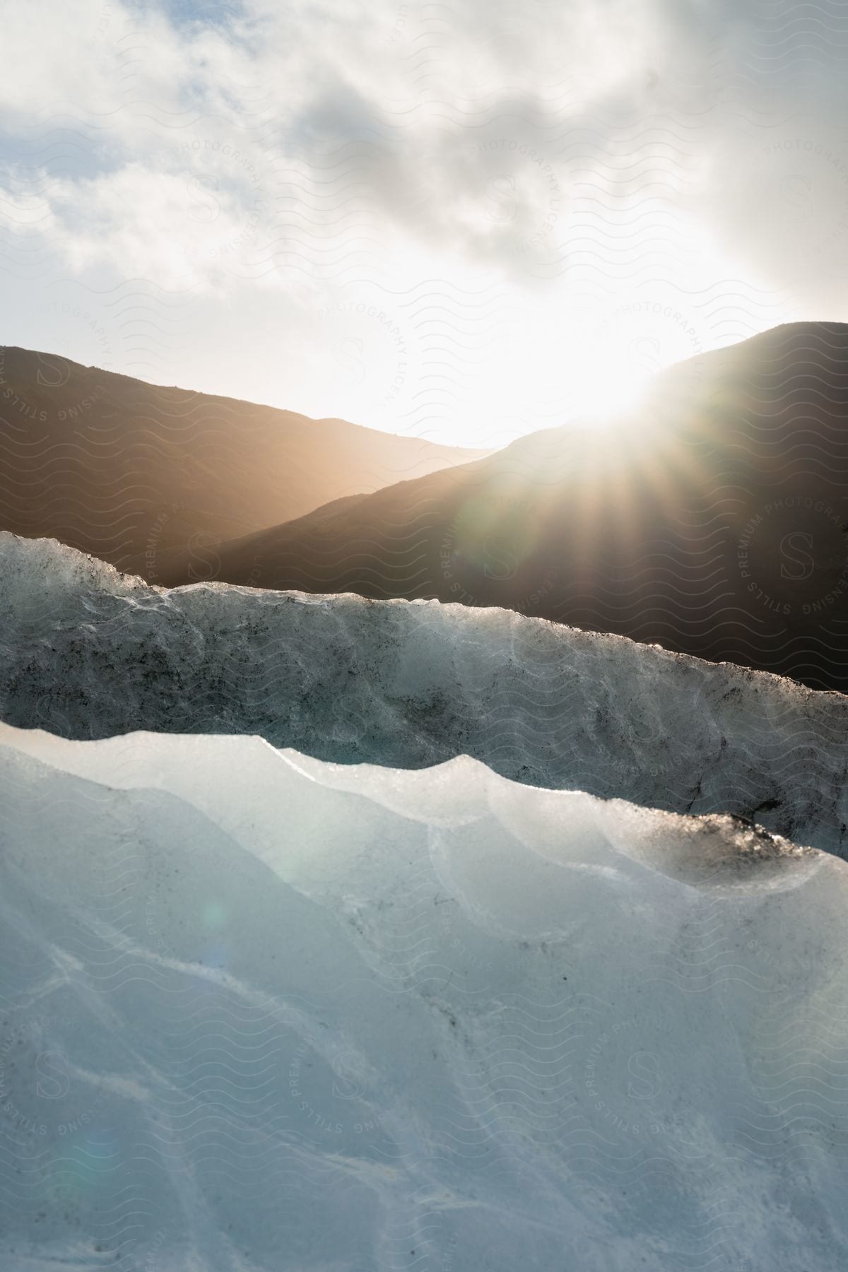 Ice in front of two mountains