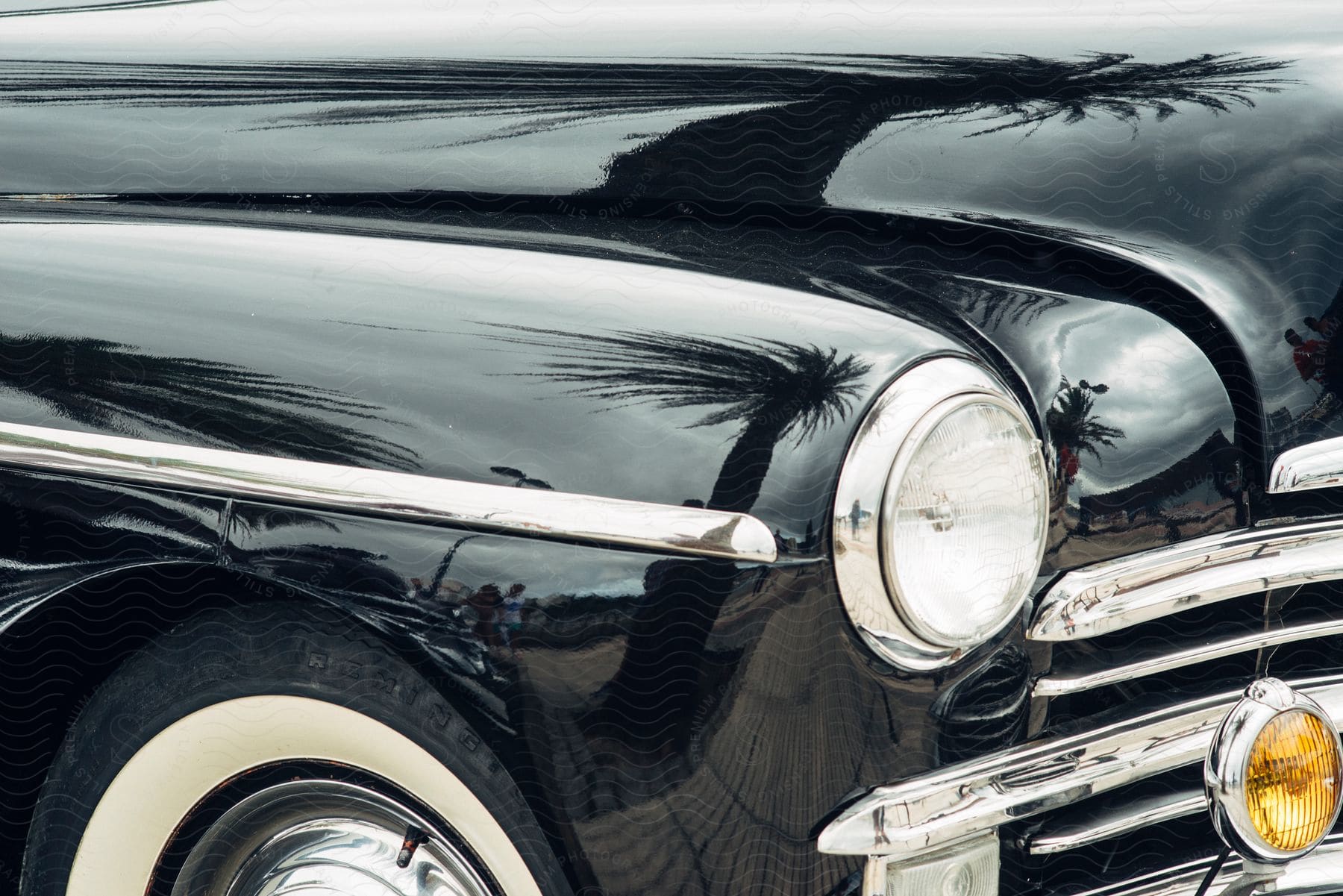 a close up of the front passenger side of a cadillac.