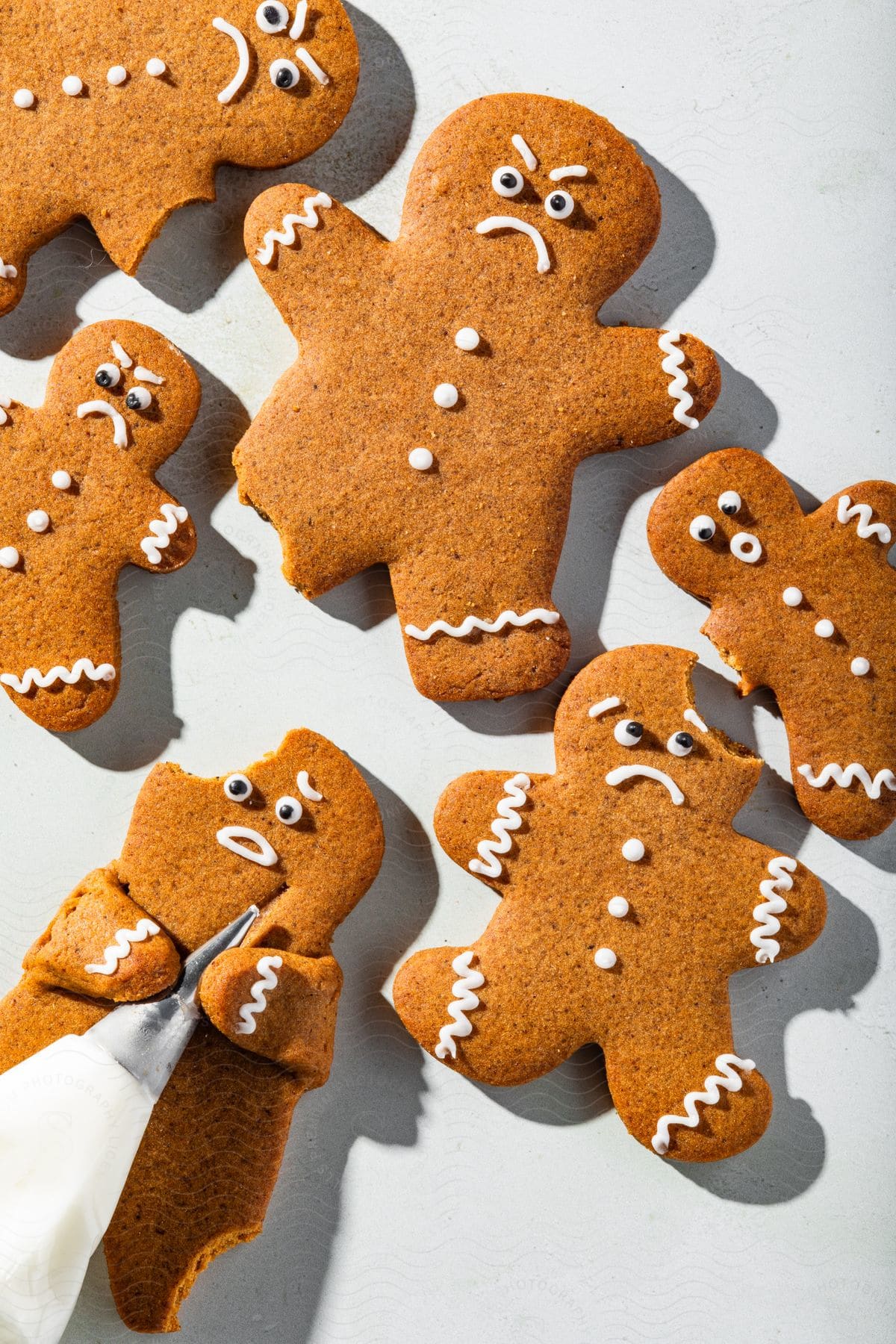 Christmas doll cookies with different facial expressions