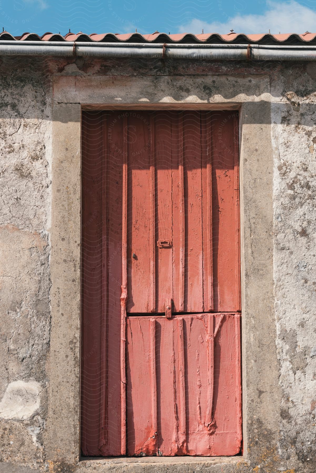 An old door to a rundown house.