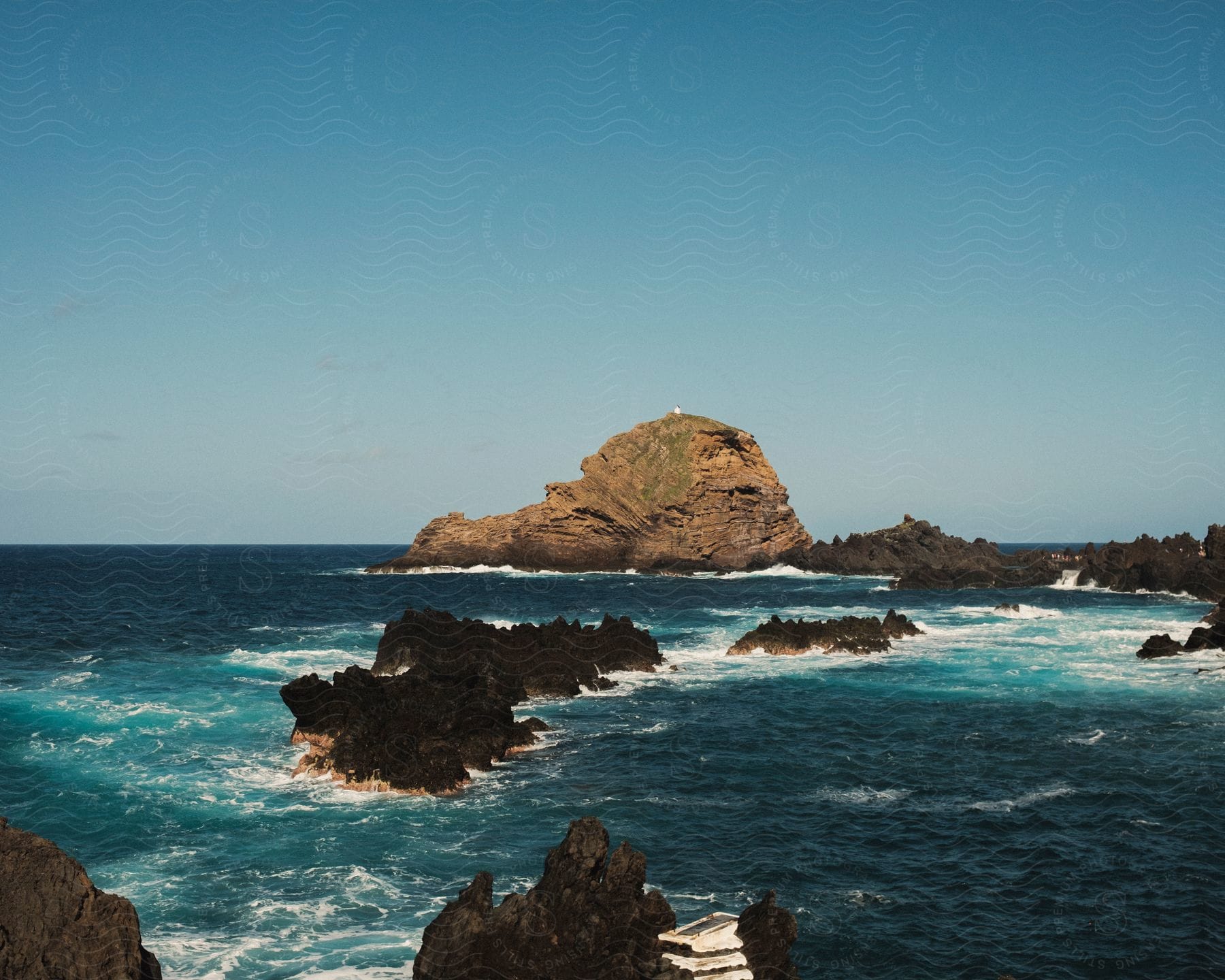 A wide clip of a rocky sea bank